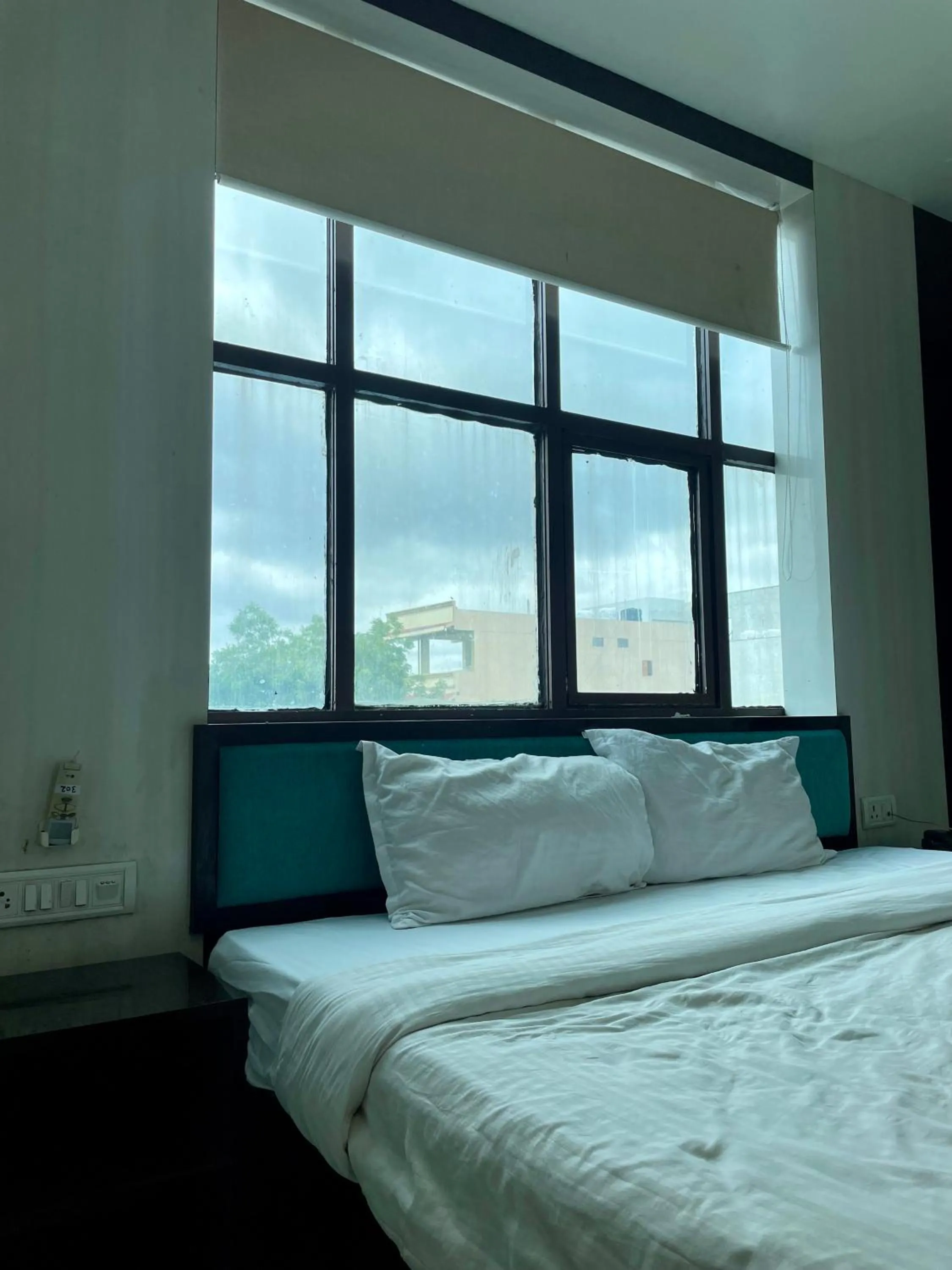 Bedroom, Bed in Hotel Komal Palace Anand Nagar