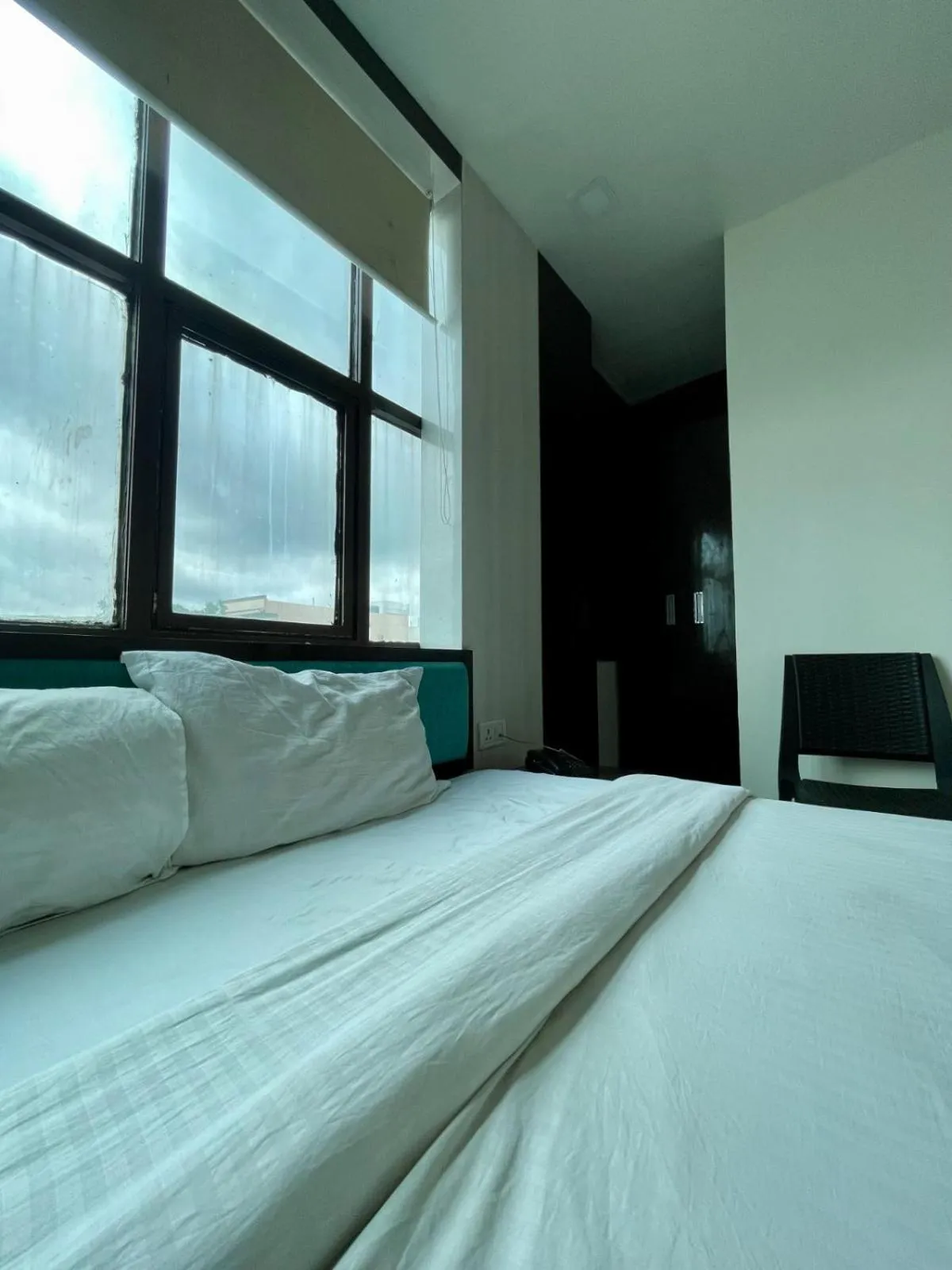 Photo of the whole room, Bed in Hotel Komal Palace Anand Nagar