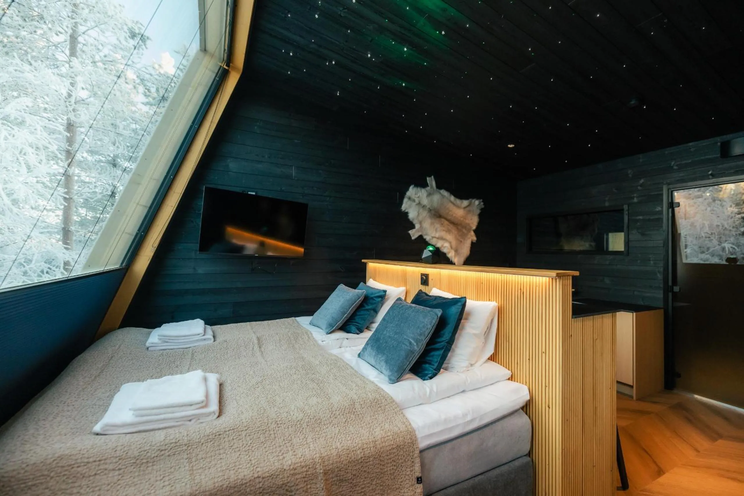 Bed in Lapland Glow Chalets