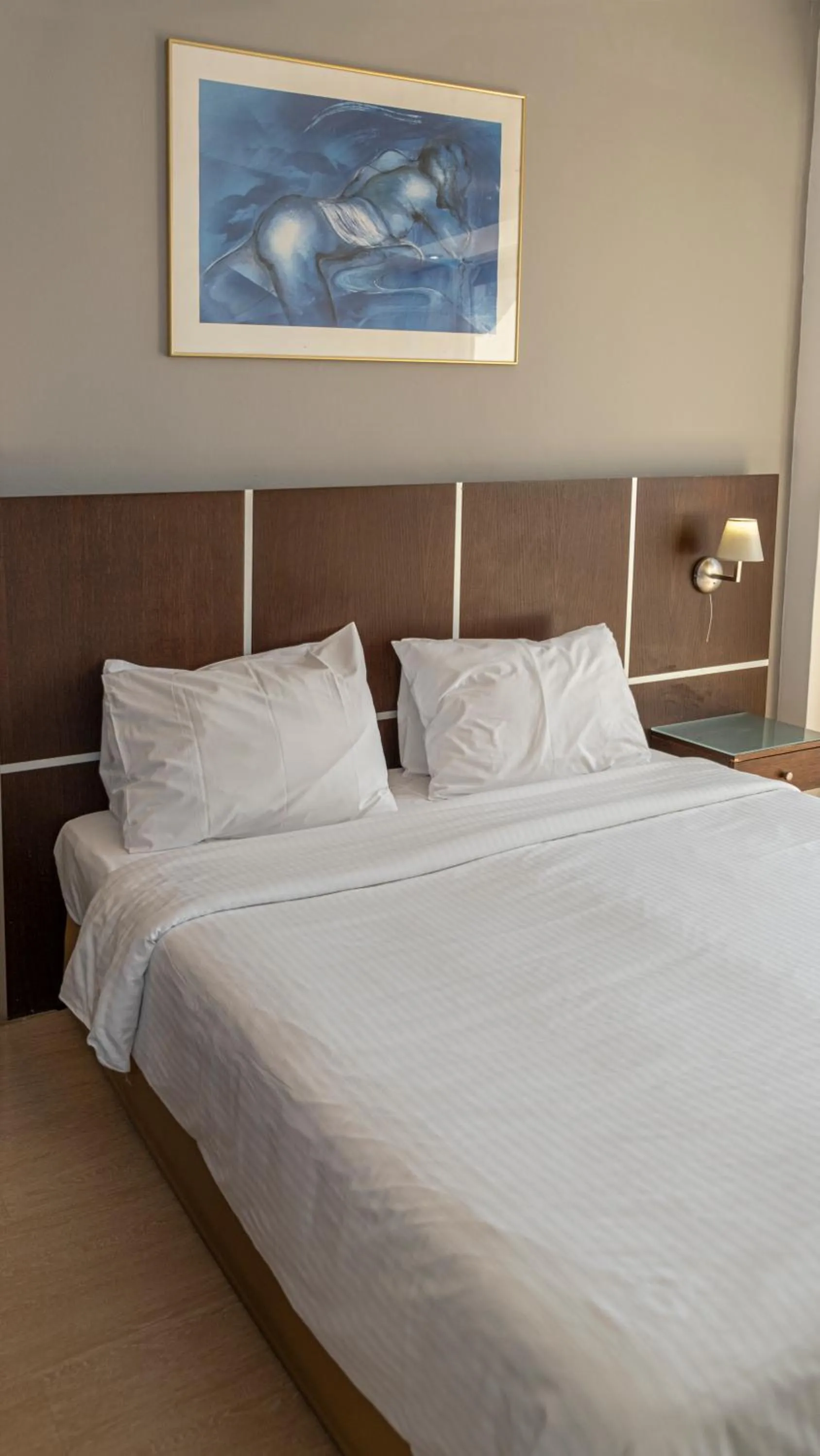 Bed in Blue Sea Hotel Alimos