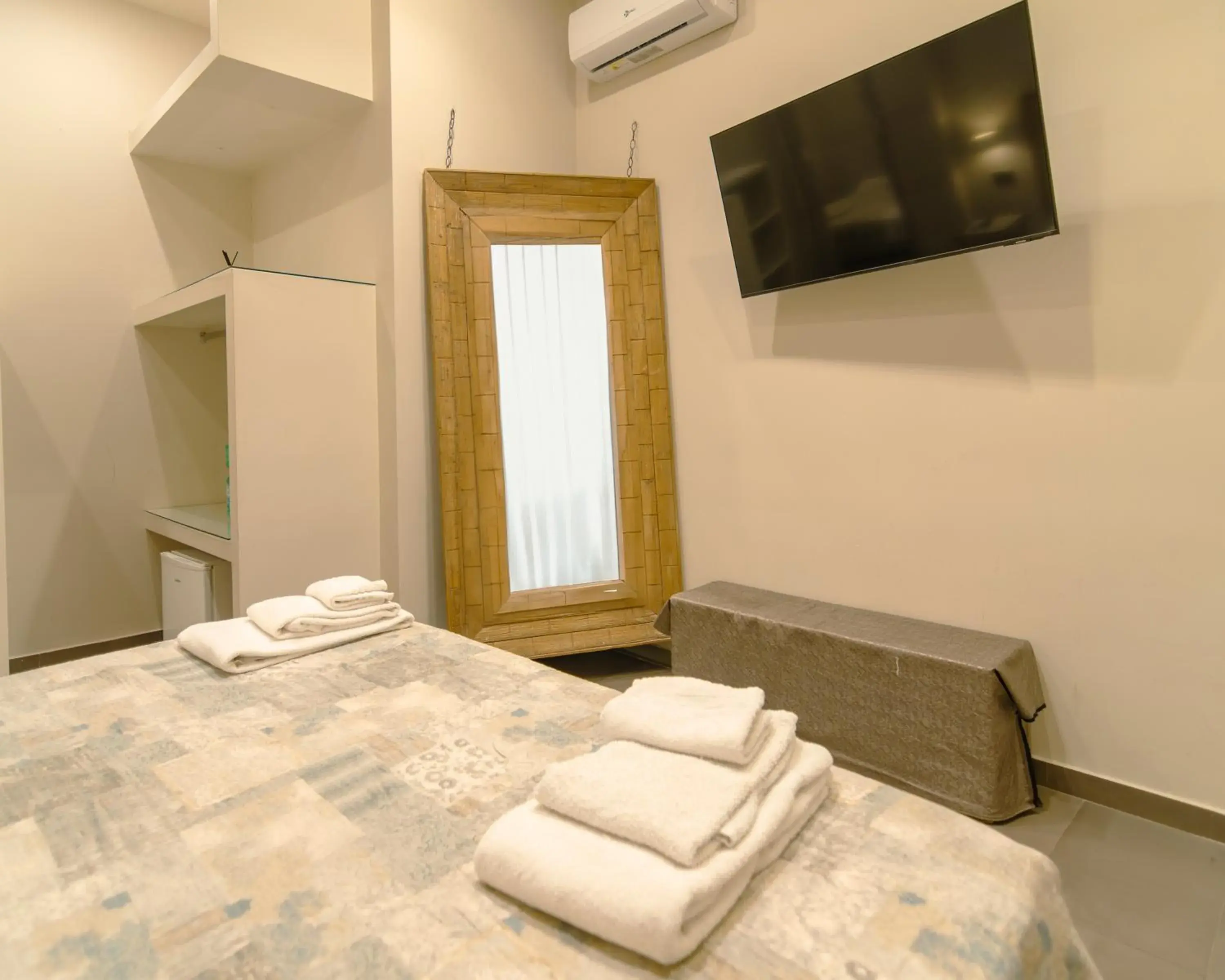 Bed in VESUVIANUS Rooms and More Bed in VESUVIANUS Rooms and More