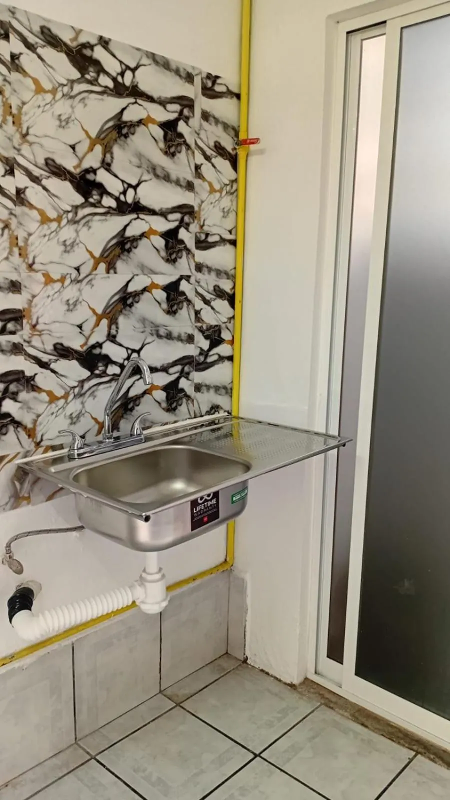 Kitchen or kitchenette in Hostal Maple