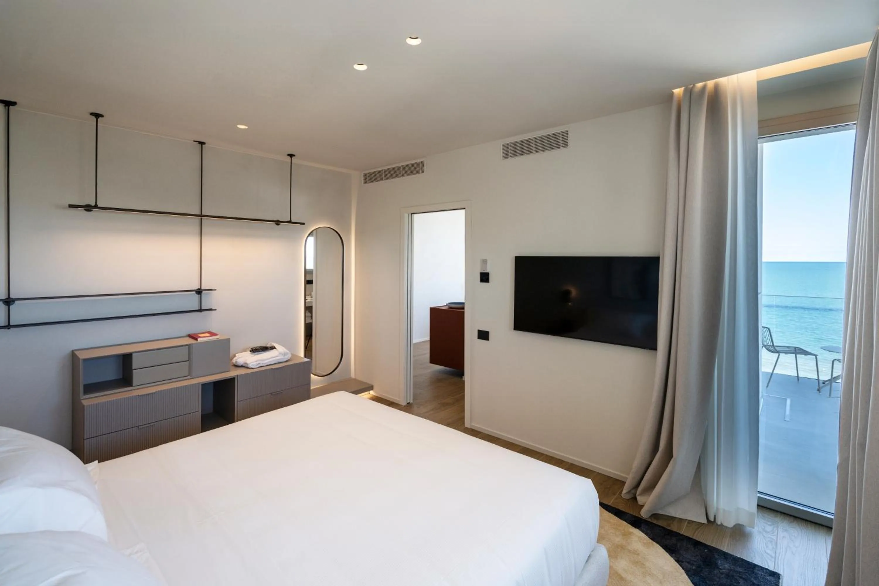 Bed in Opera Suite Hotel Pesaro