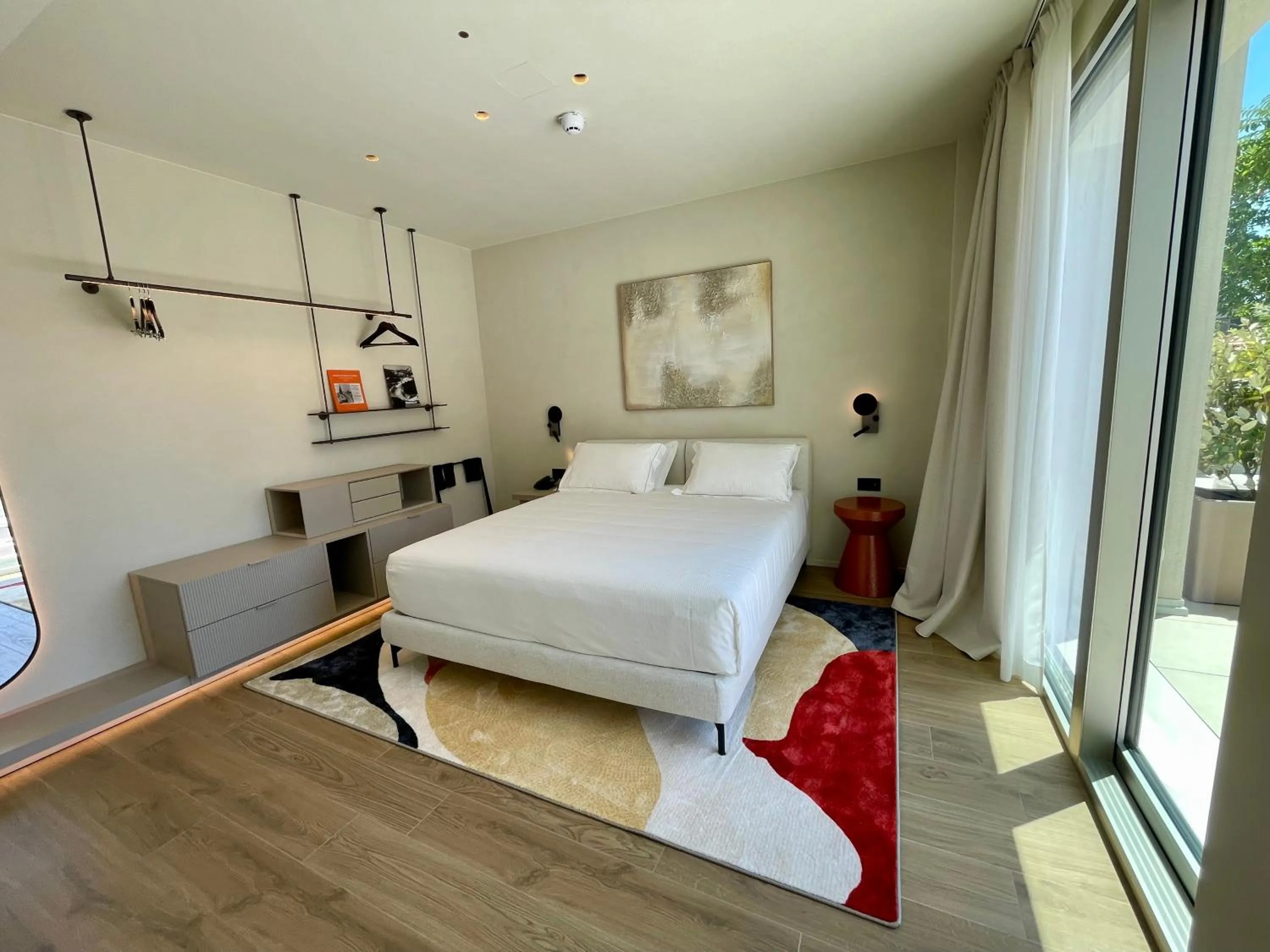 Bed in Opera Suite Hotel Pesaro