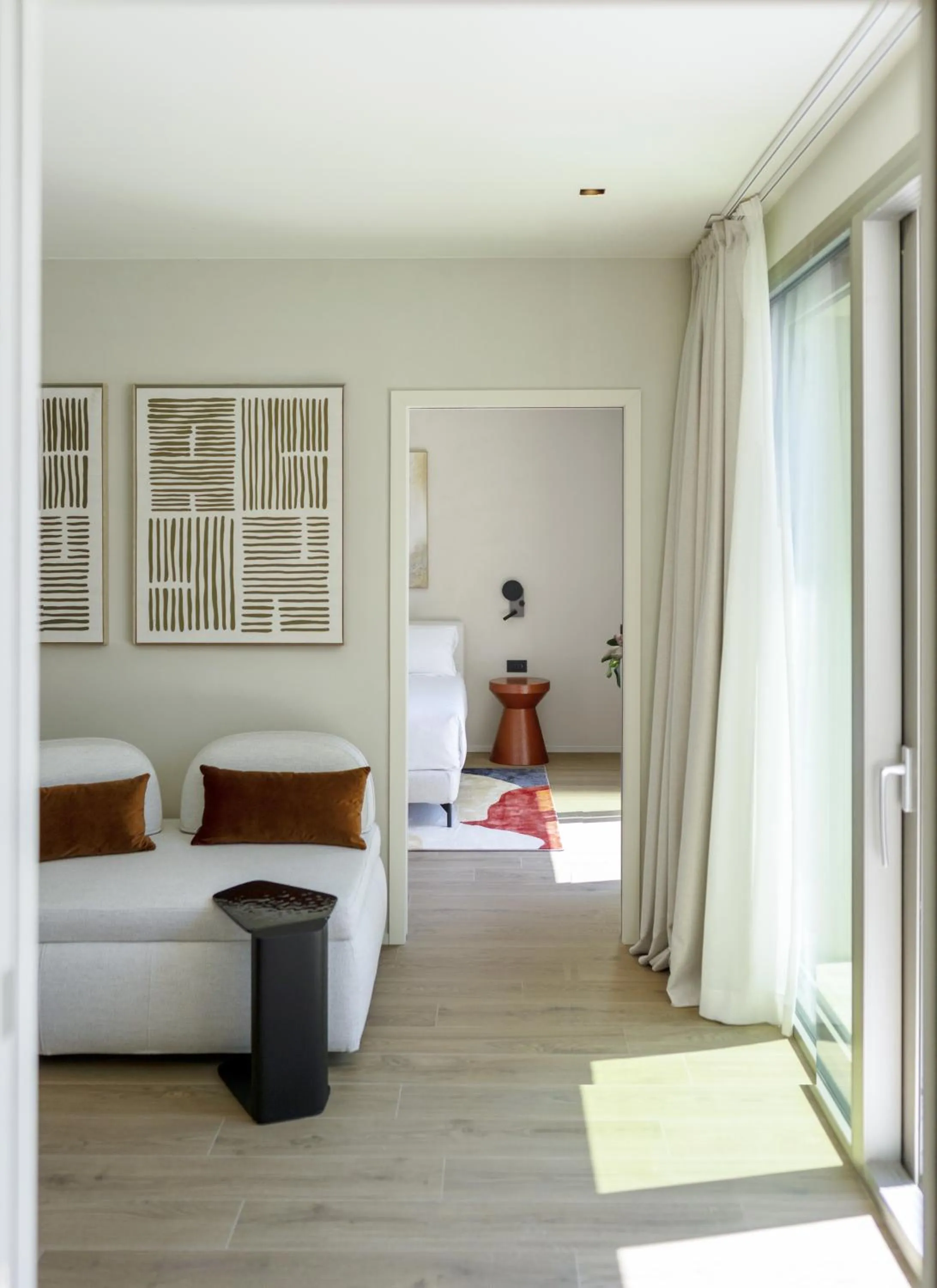 Living room, Bed in Opera Suite Hotel Pesaro