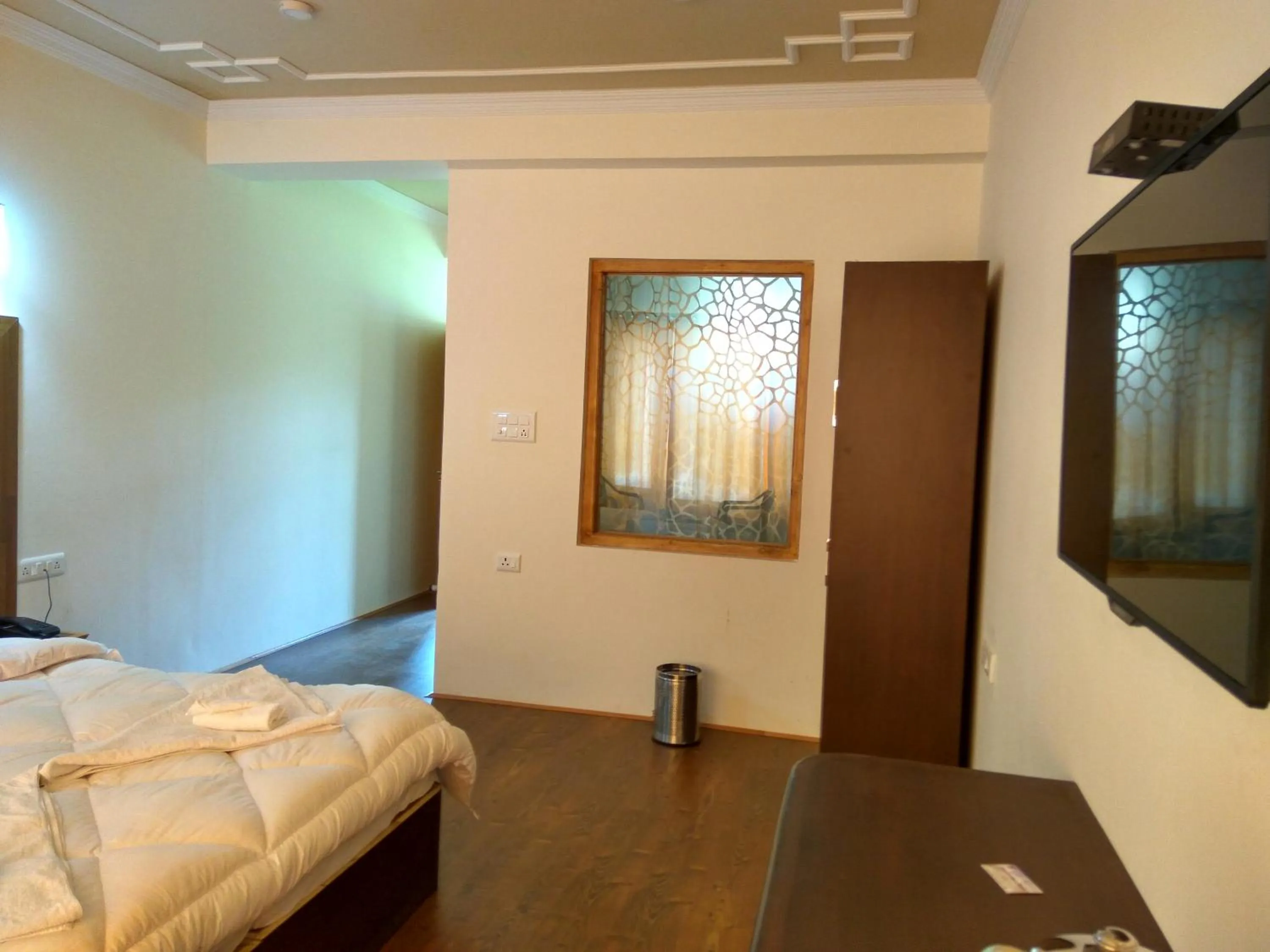 Photo of the whole room, Bed in Shaolin Ladakh