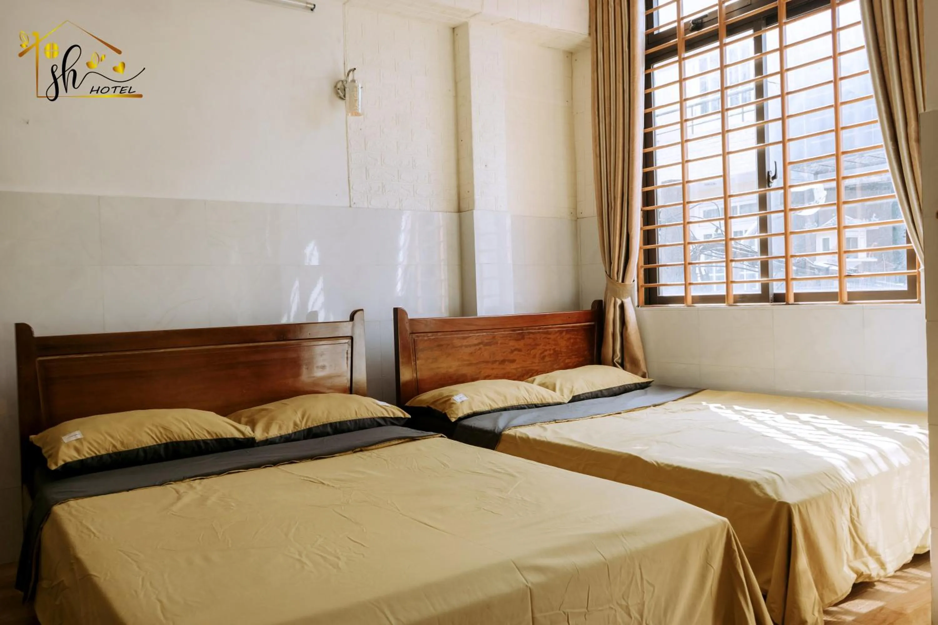 Photo of the whole room, Bed in SH Hotel