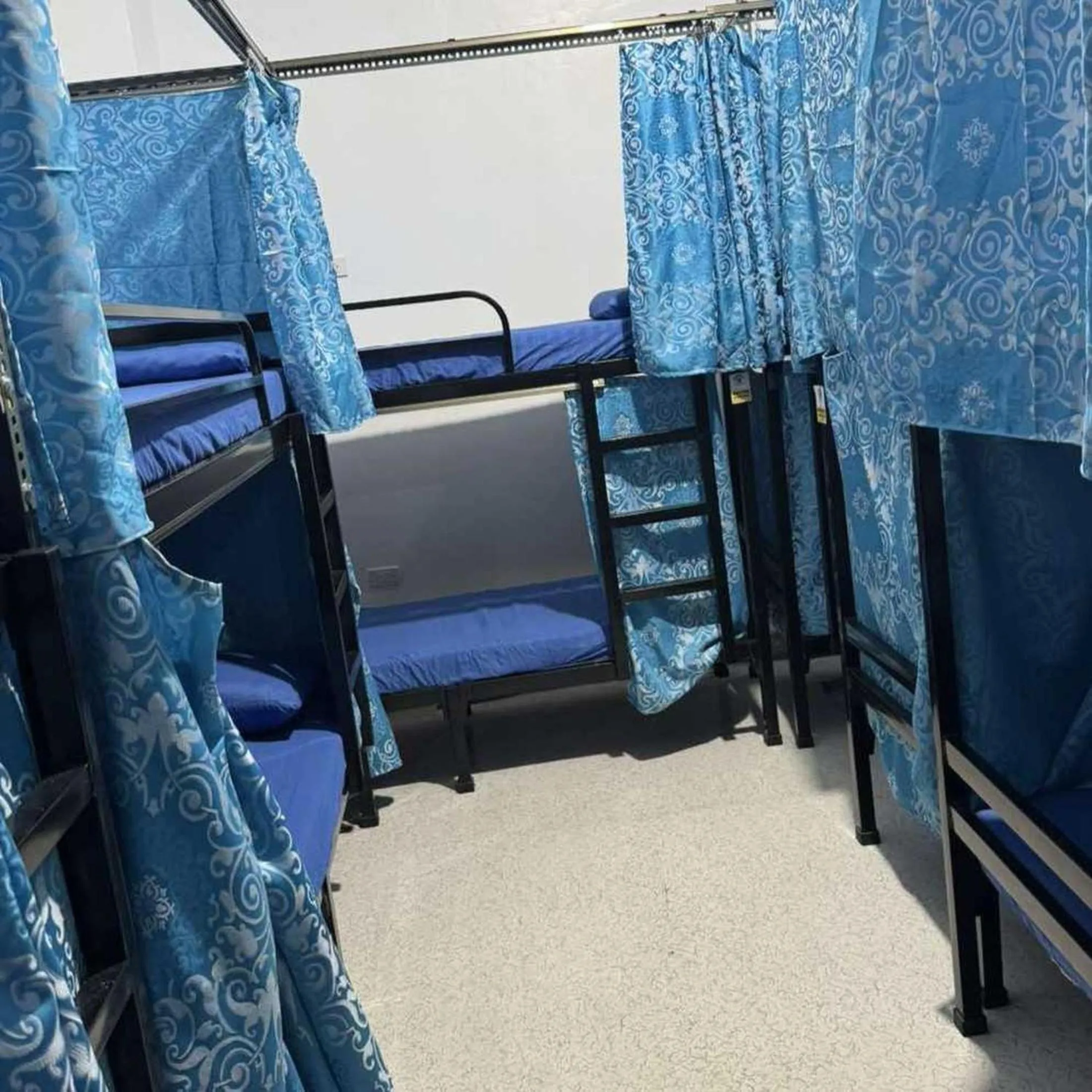 Bed in OYO 1155 Carnivale Inn