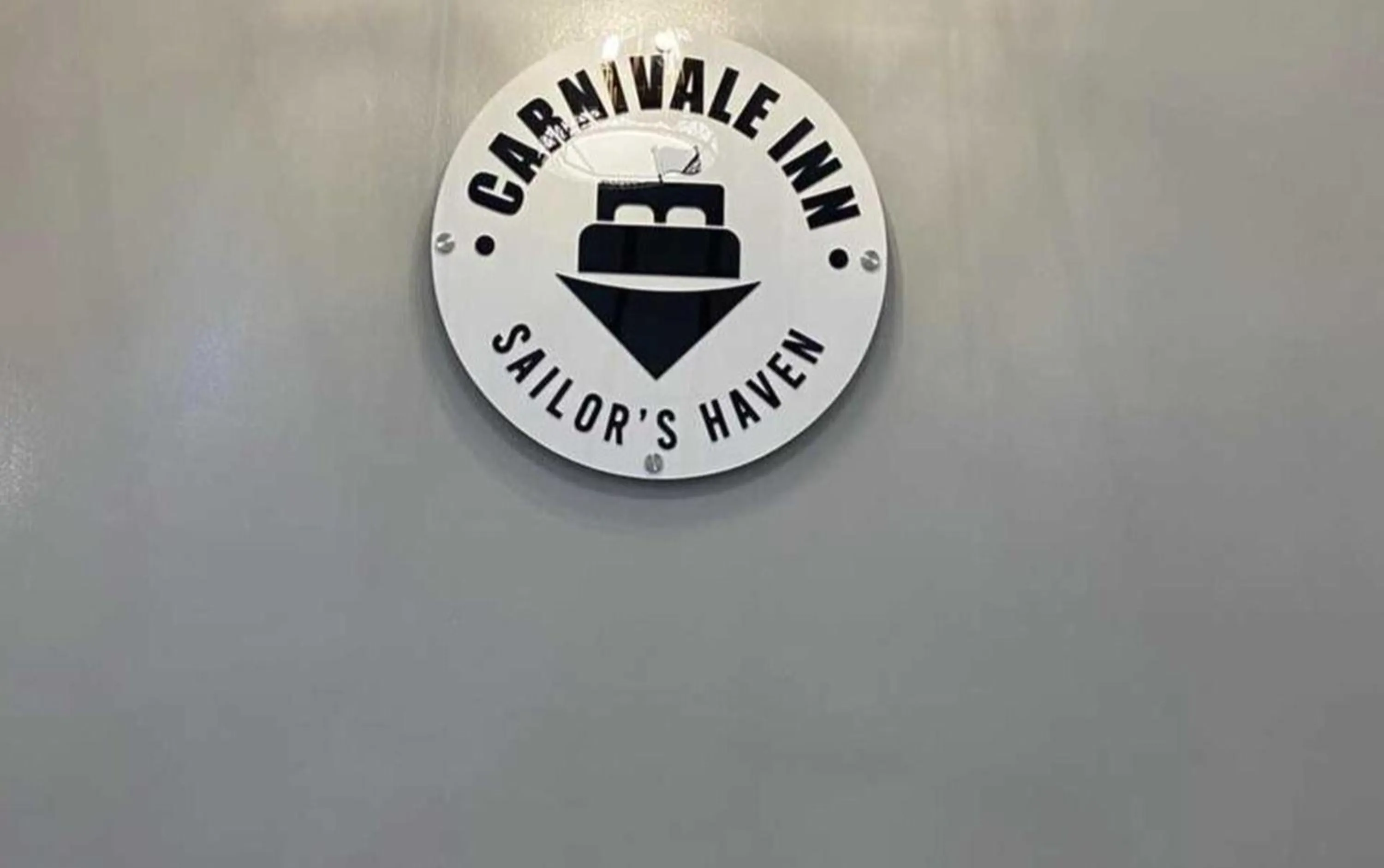 Logo/Certificate/Sign in OYO 1155 Carnivale Inn