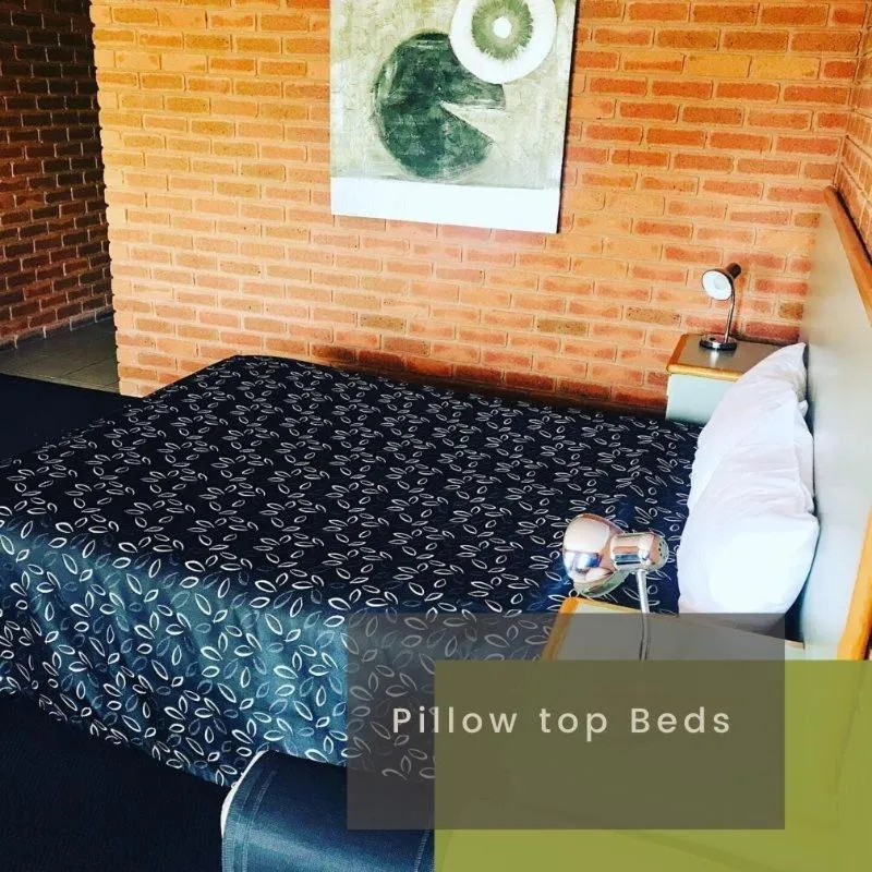 Bed in Mulwala Paradise Palms Motel