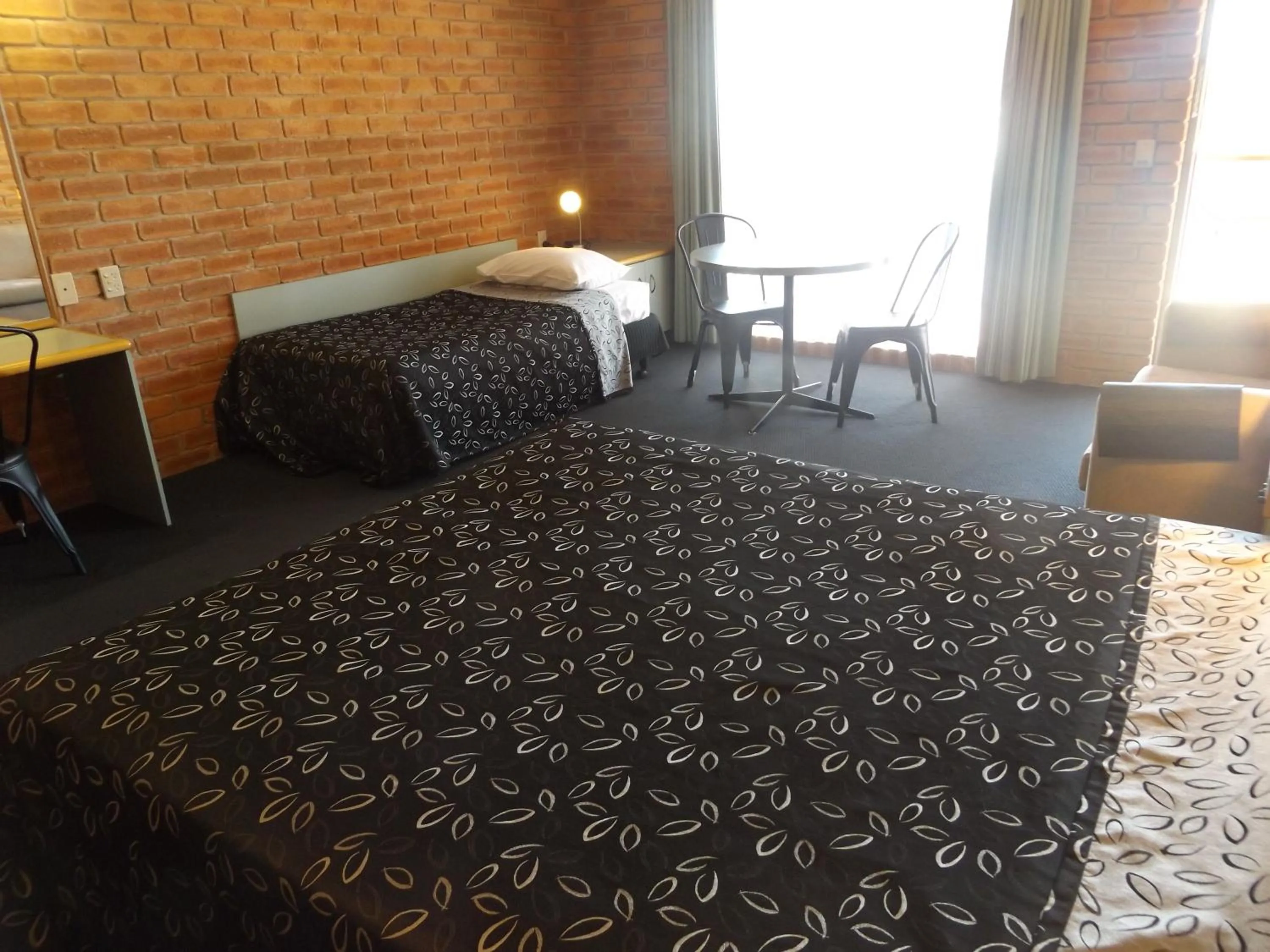 Bed in Mulwala Paradise Palms Motel