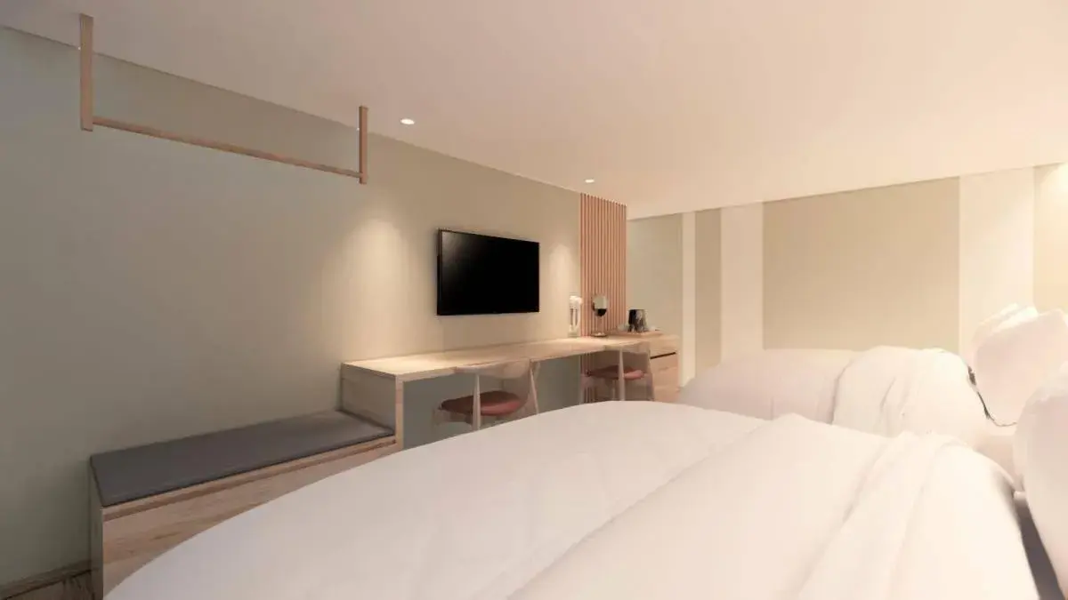 Bed in Ta Lee Hotel Bed in Ta Lee Hotel