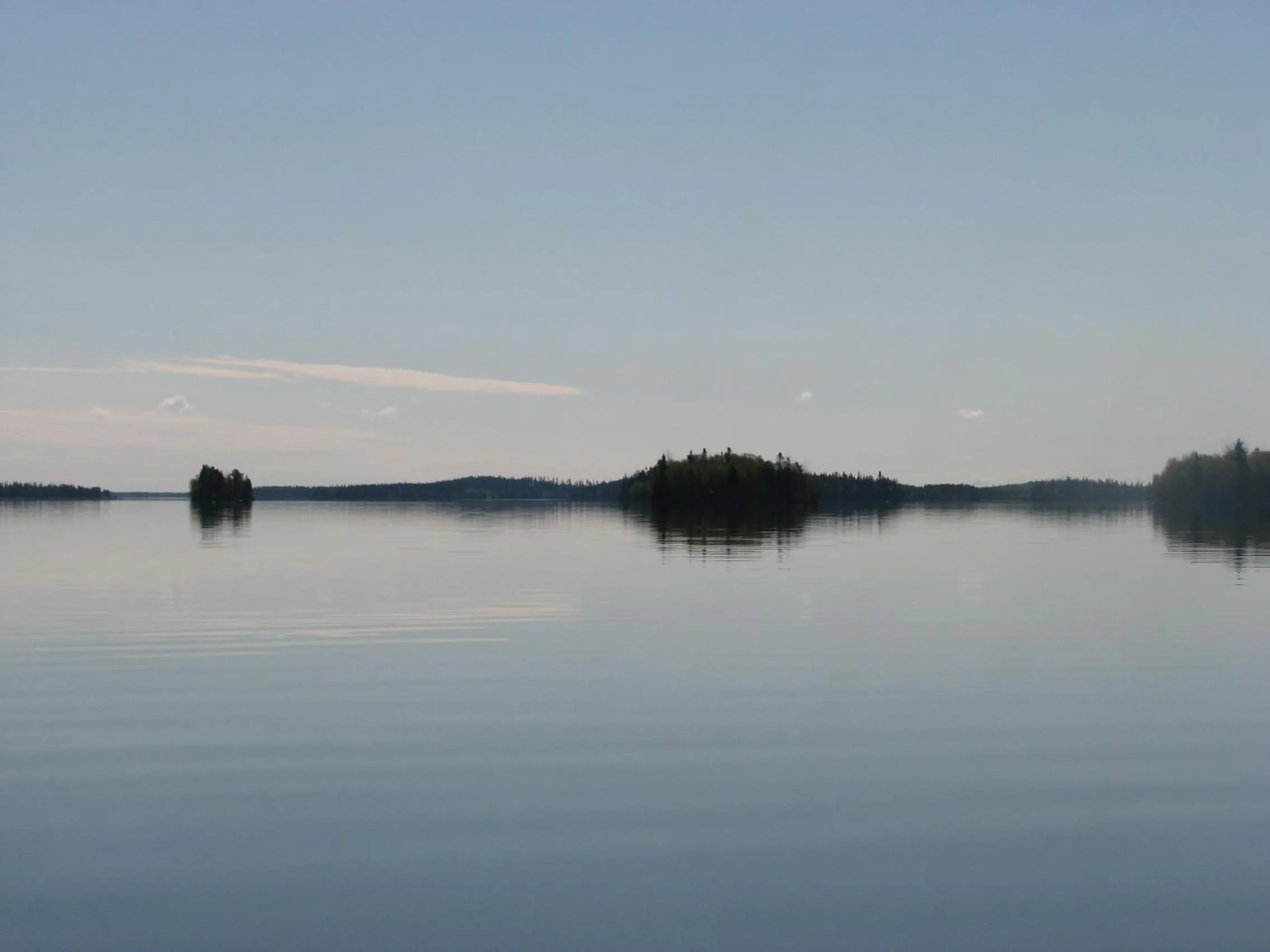Canoeing in Ollilan Lomamajat