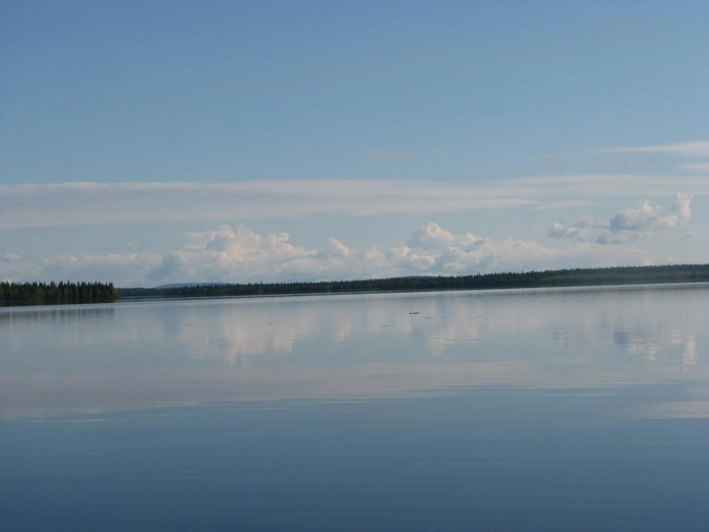 Canoeing in Ollilan Lomamajat