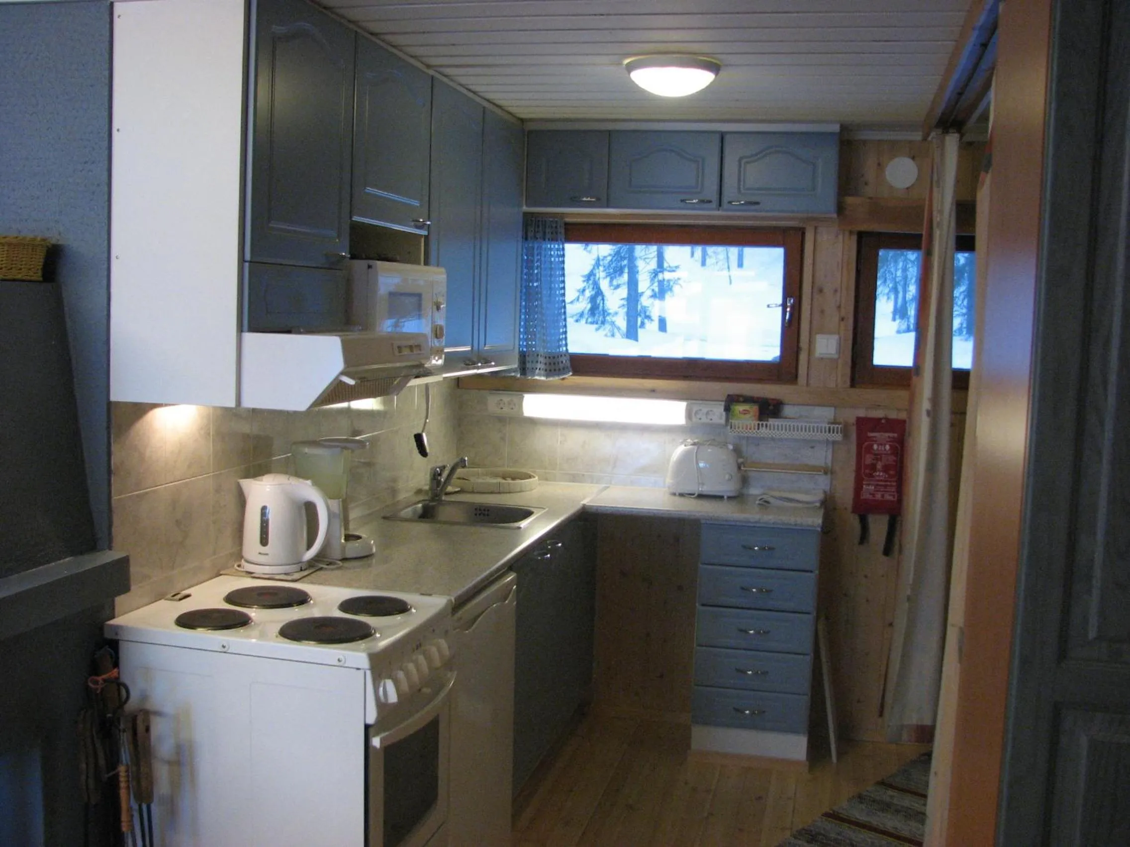 Kitchen or kitchenette in Ollilan Lomamajat