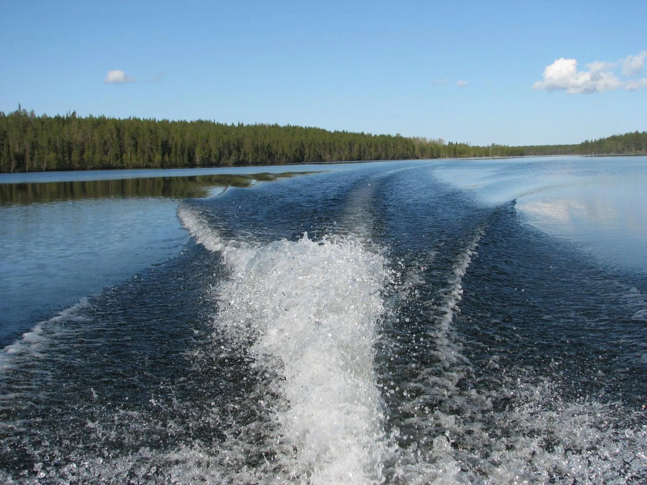 Canoeing in Ollilan Lomamajat