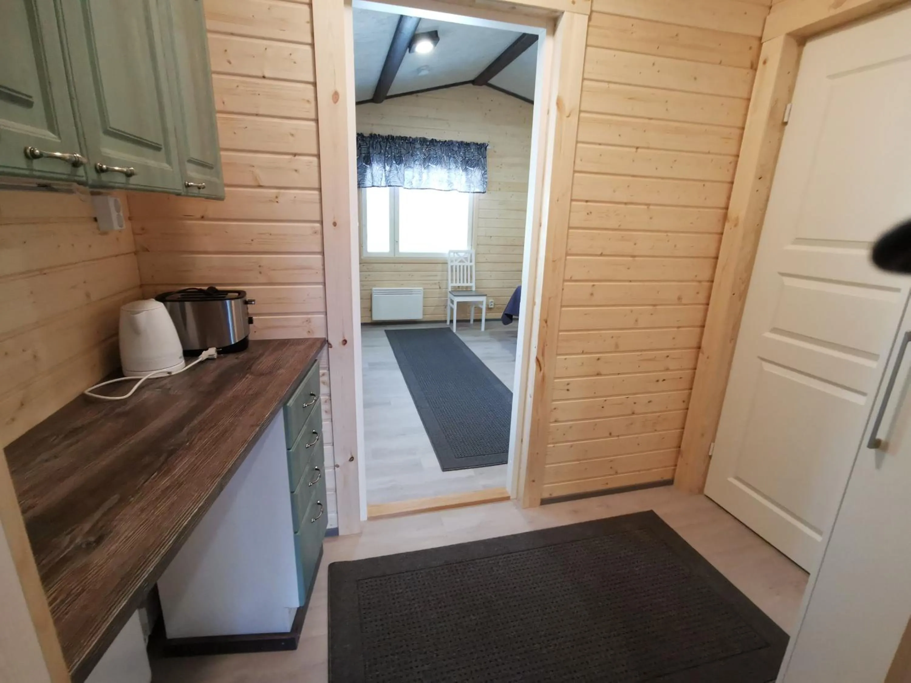 Kitchen or kitchenette in Ollilan Lomamajat