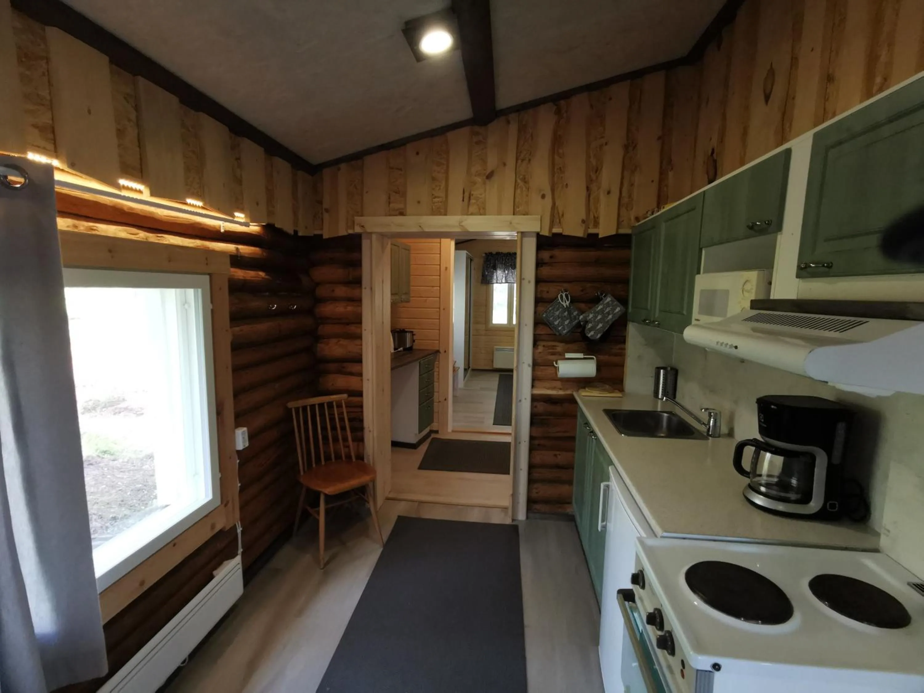 Kitchen or kitchenette in Ollilan Lomamajat