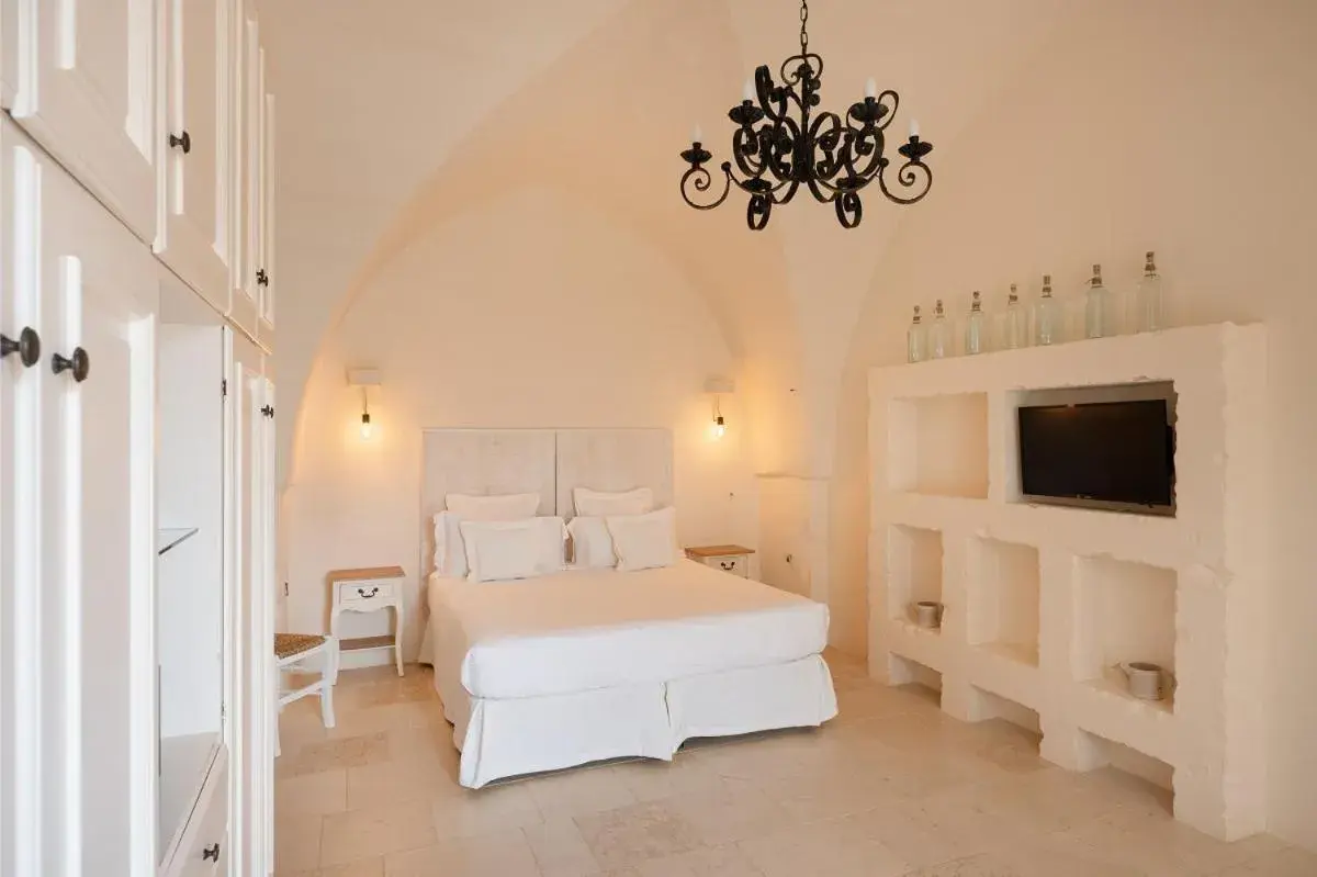 Bed in Masseria Le Carrube Bed in Masseria Le Carrube