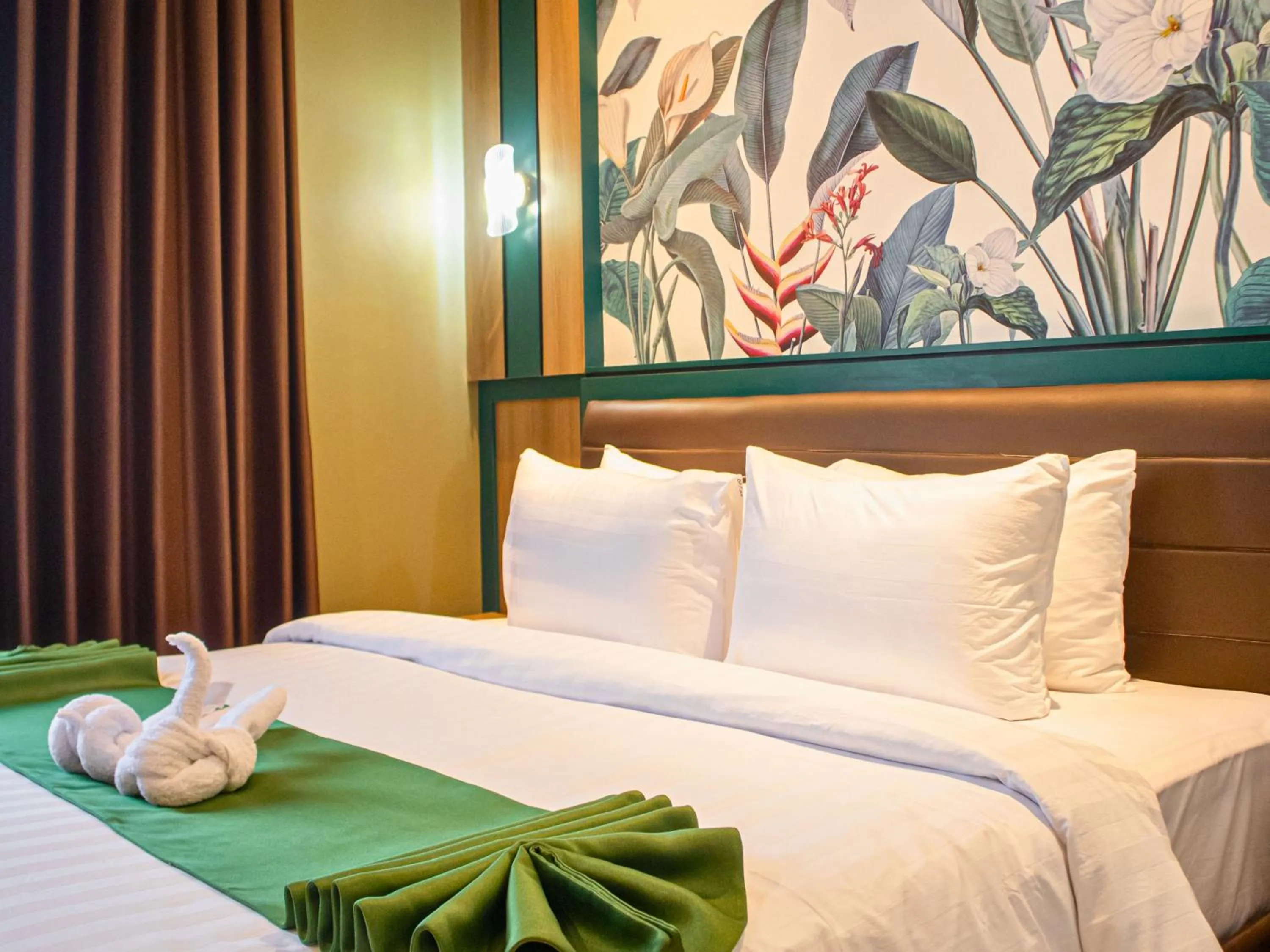 Bed in Bona Ventura Hotel & Skybar