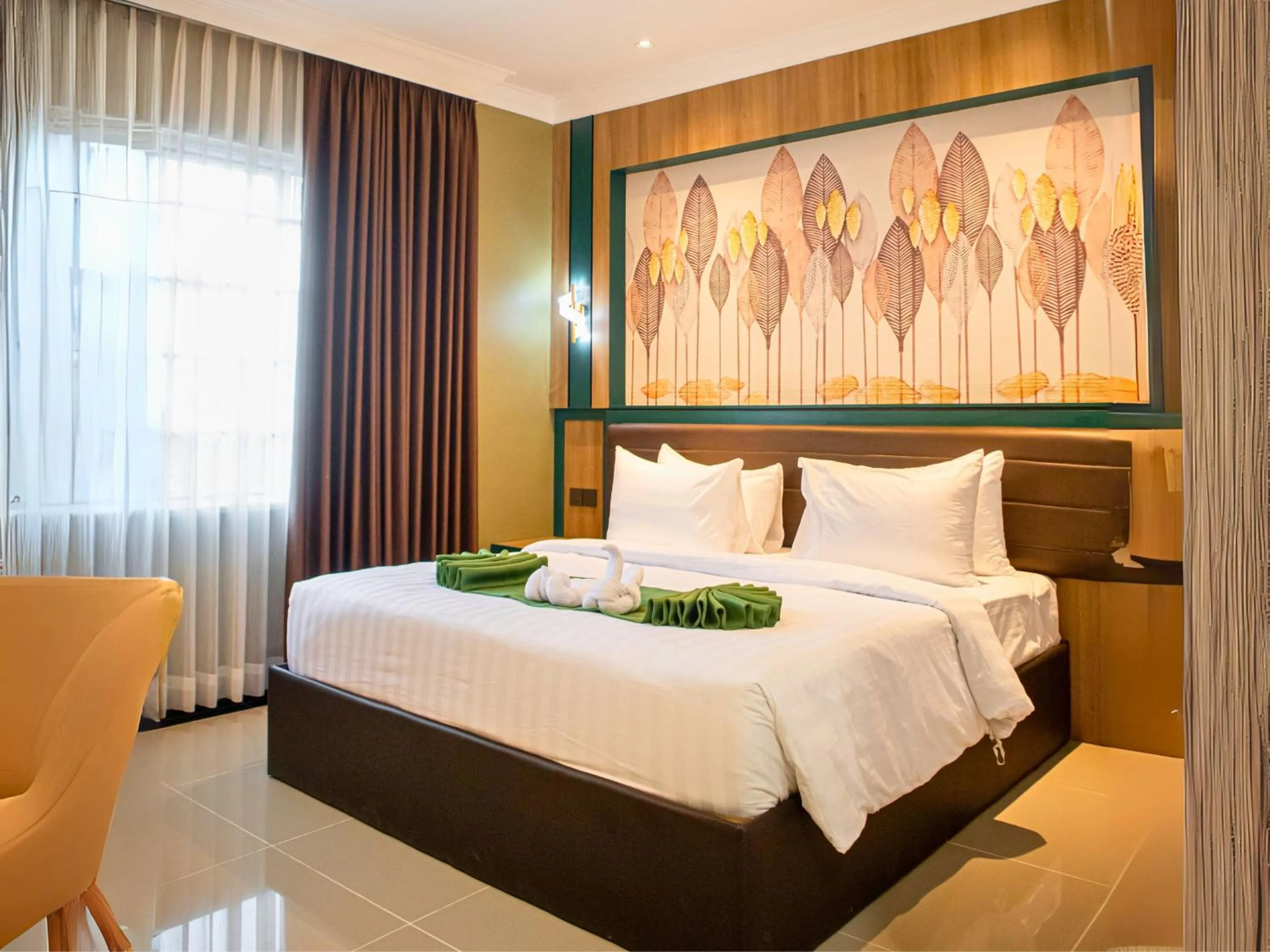 Bed in Bona Ventura Hotel & Skybar