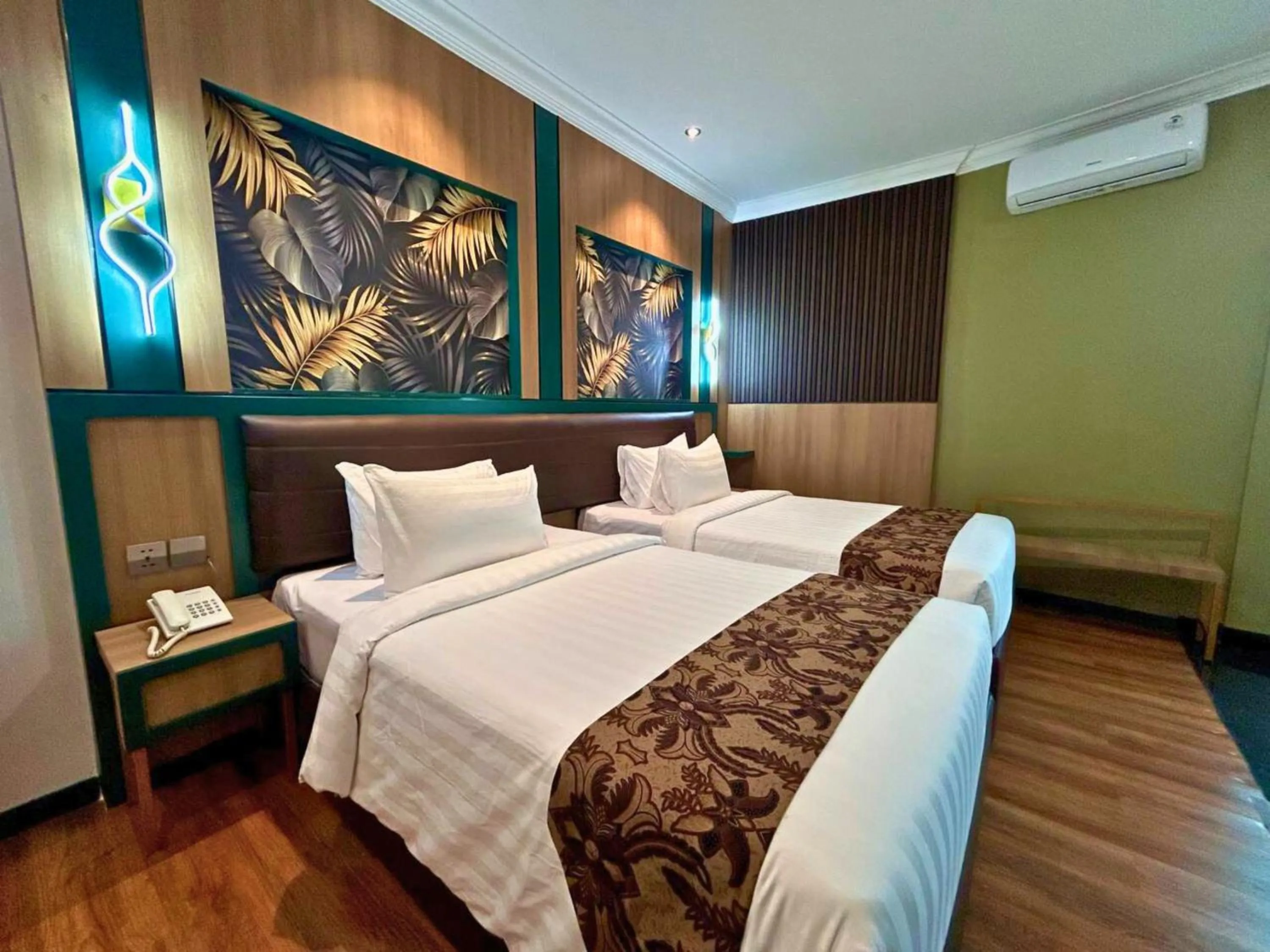 Bed in Bona Ventura Hotel & Skybar