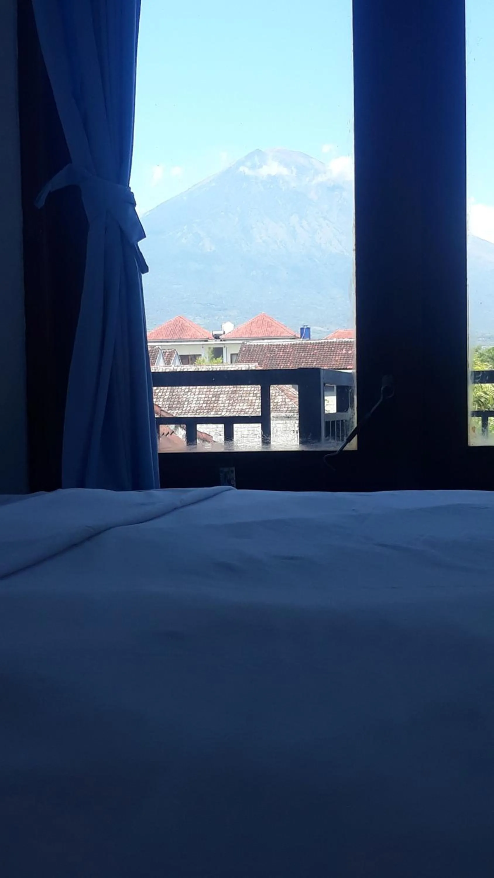 Bed in Pakel's Bali Villas