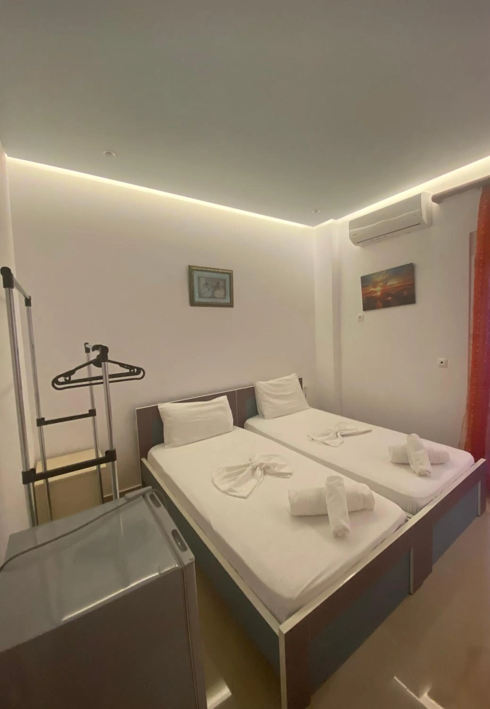 Bed in Kalemi's Beachside Hotel