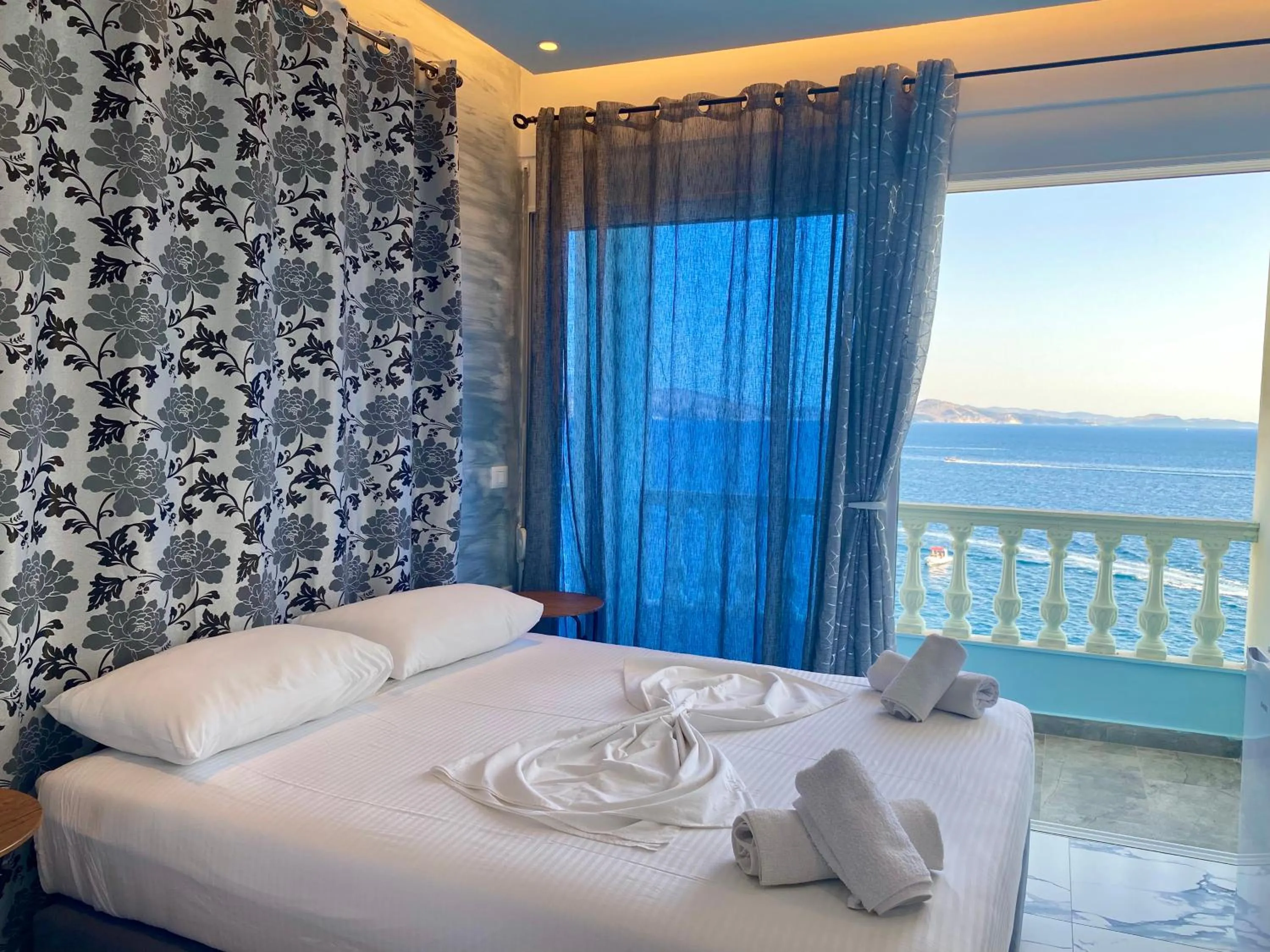 Bed in Kalemi's Beachside Hotel