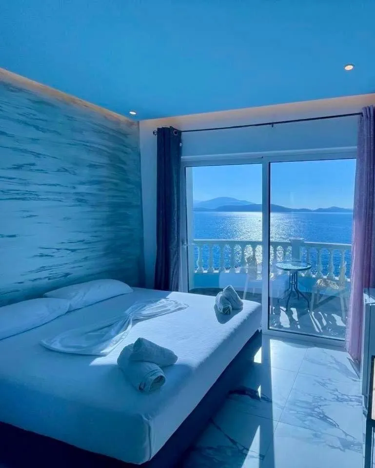 Bed in Kalemi's Beachside Hotel