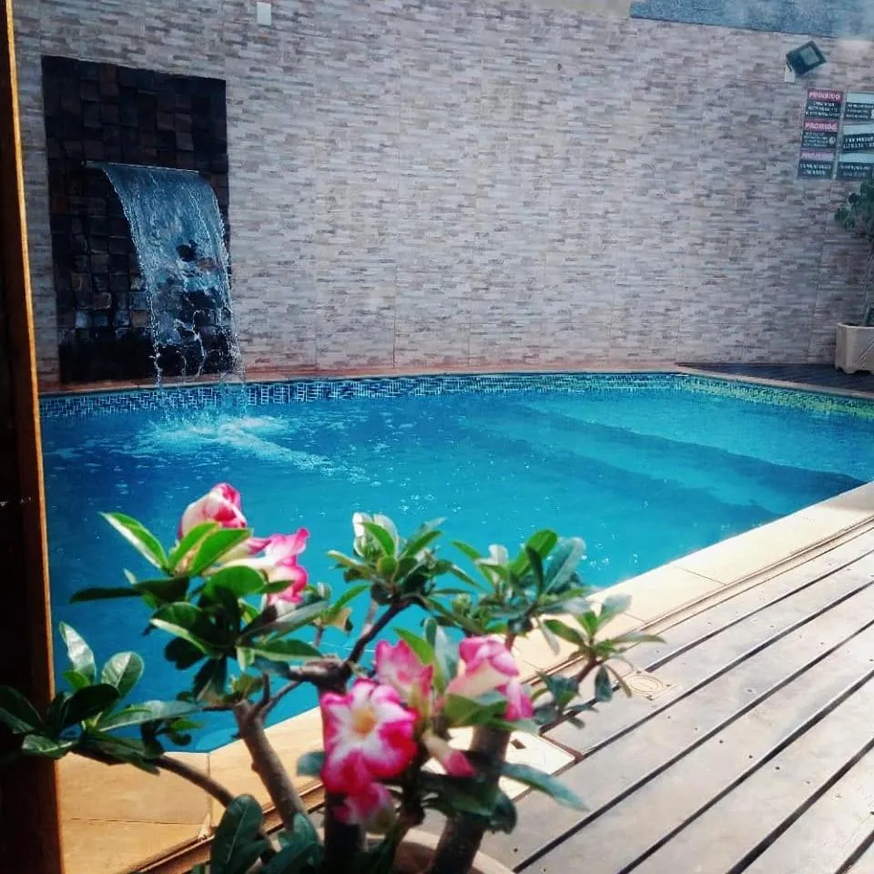 Swimming pool in Pousada Recanto da Morada