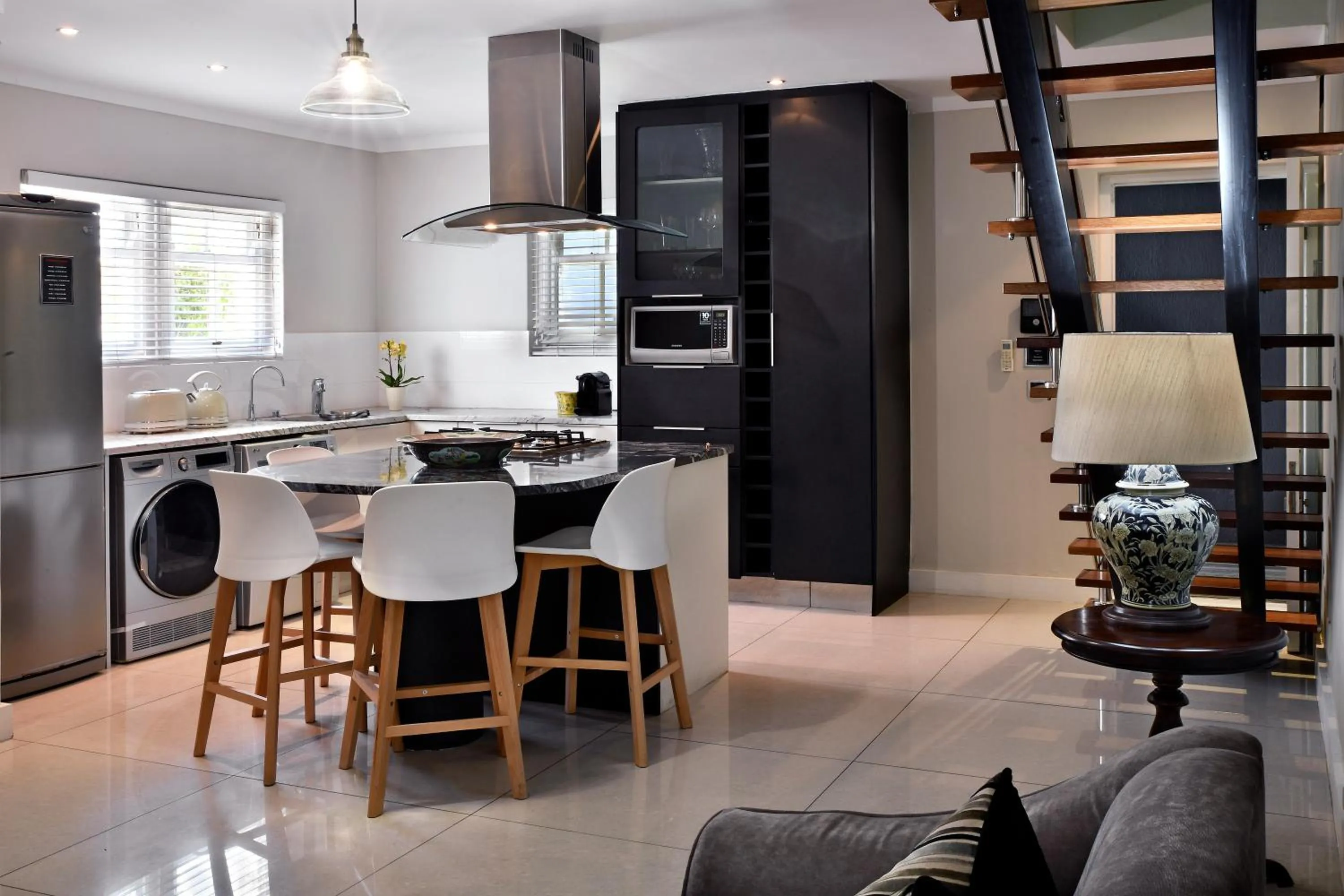 Kitchen or kitchenette in Le Petit Bijou Aparthotel