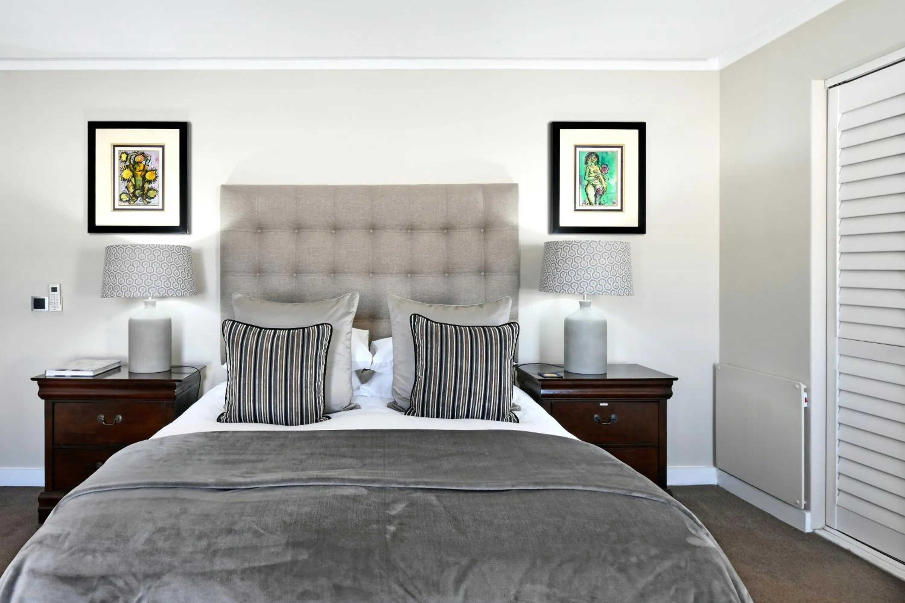 Bed in Le Petit Bijou Aparthotel