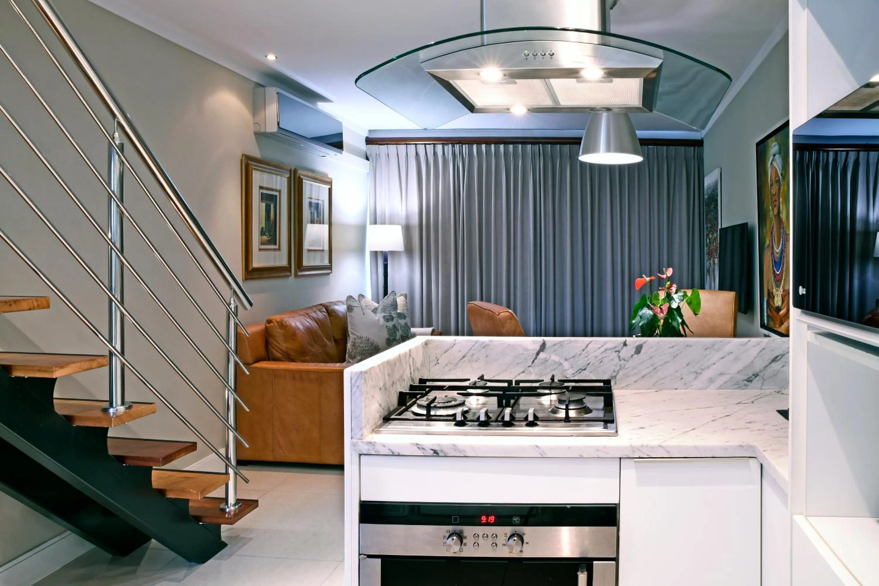 stove in Le Petit Bijou Aparthotel