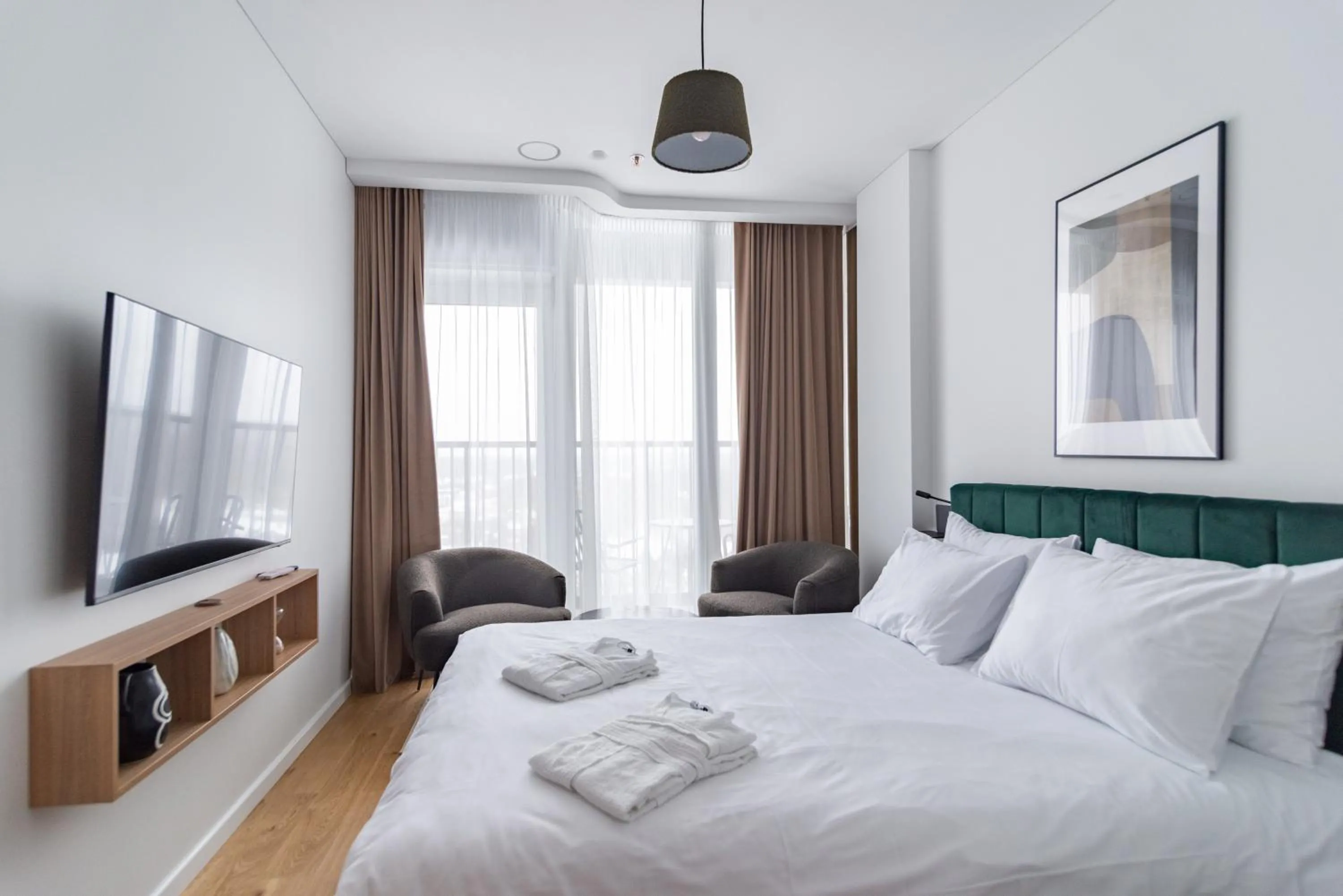 Bed in Aparthotel Nemunas