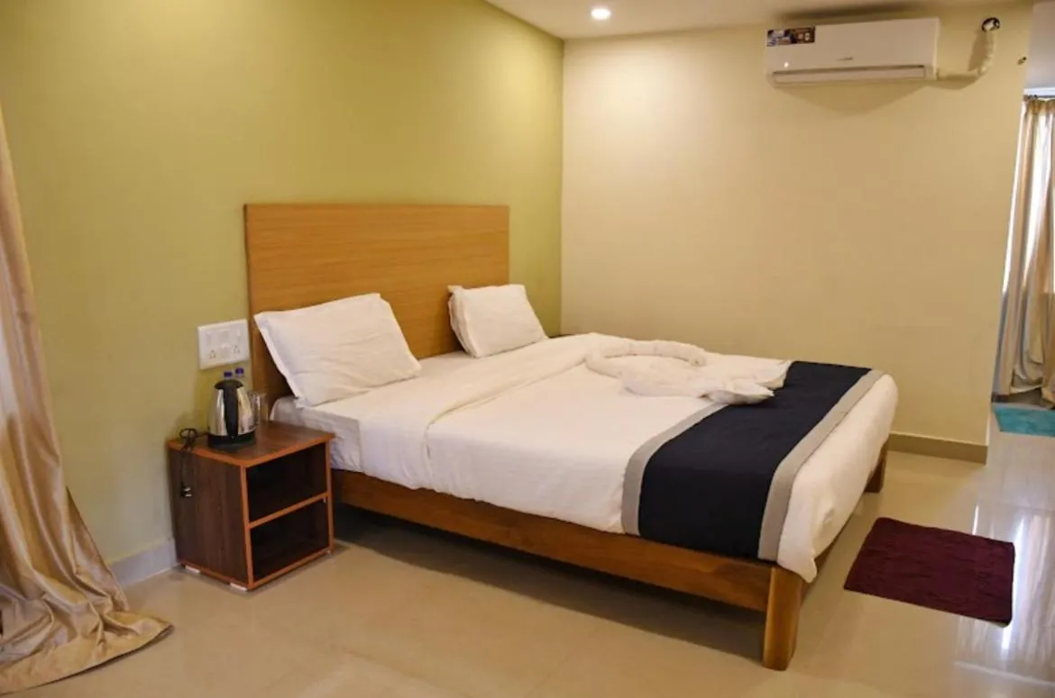 Bed in Kartik Resort