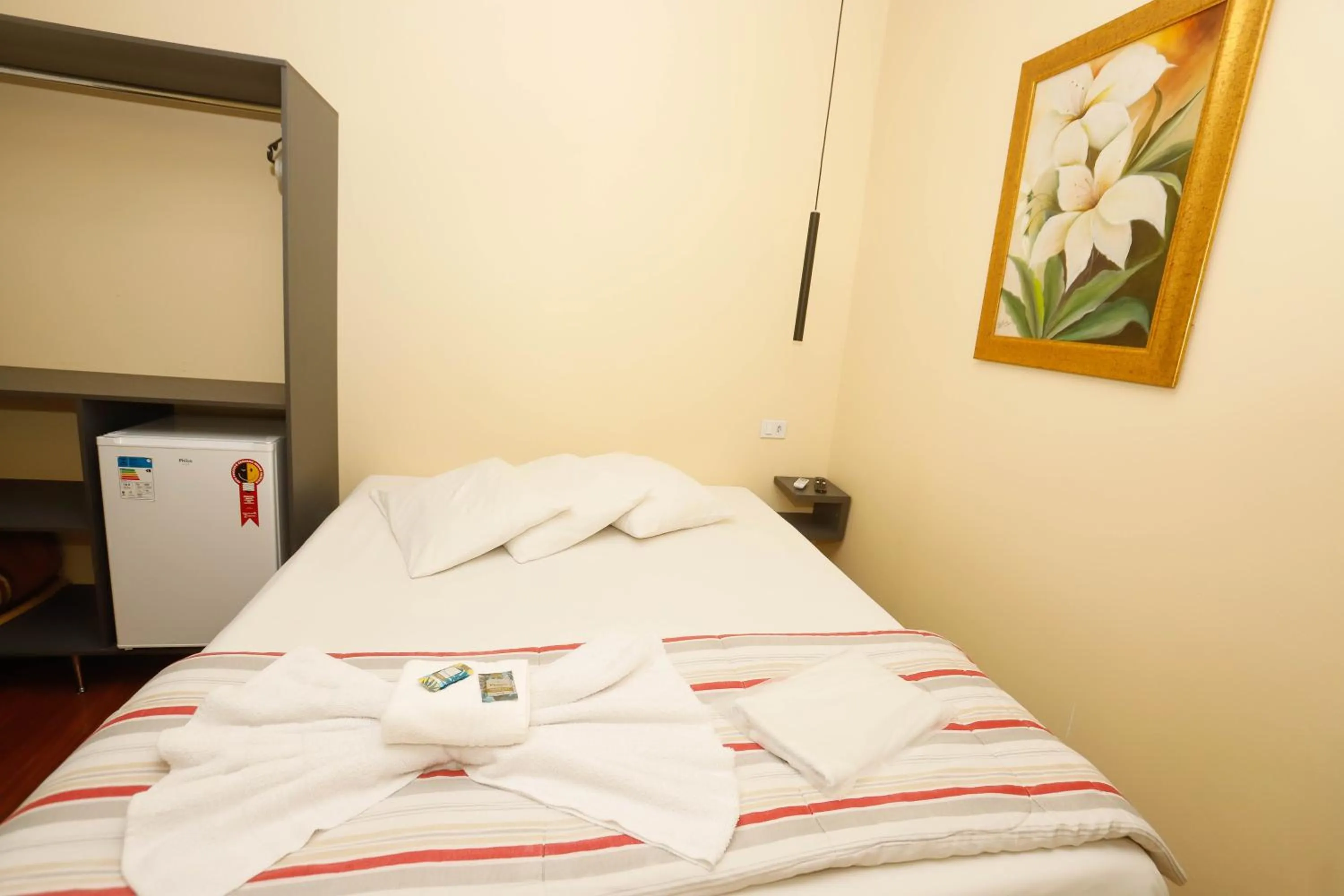 air conditioner, Bed in Hotel Garfo de Ouro