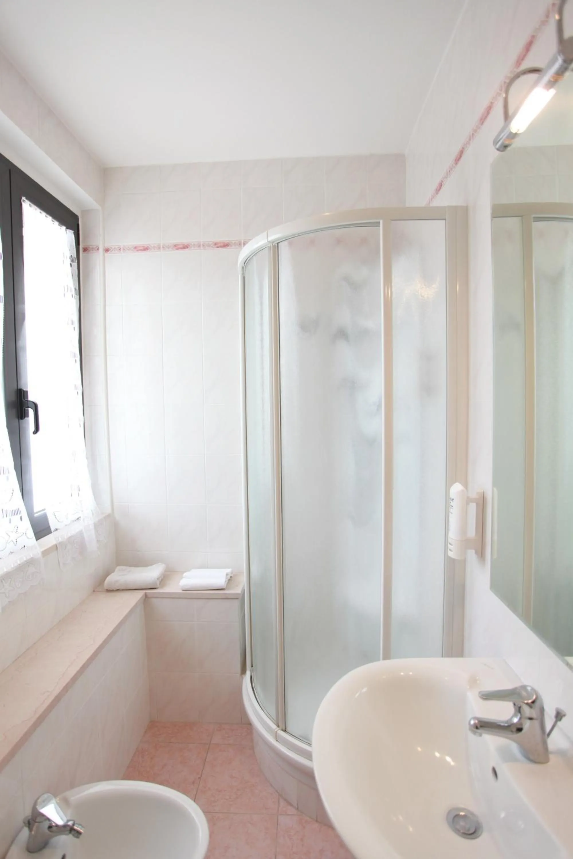 Bathroom in Hotel Athena