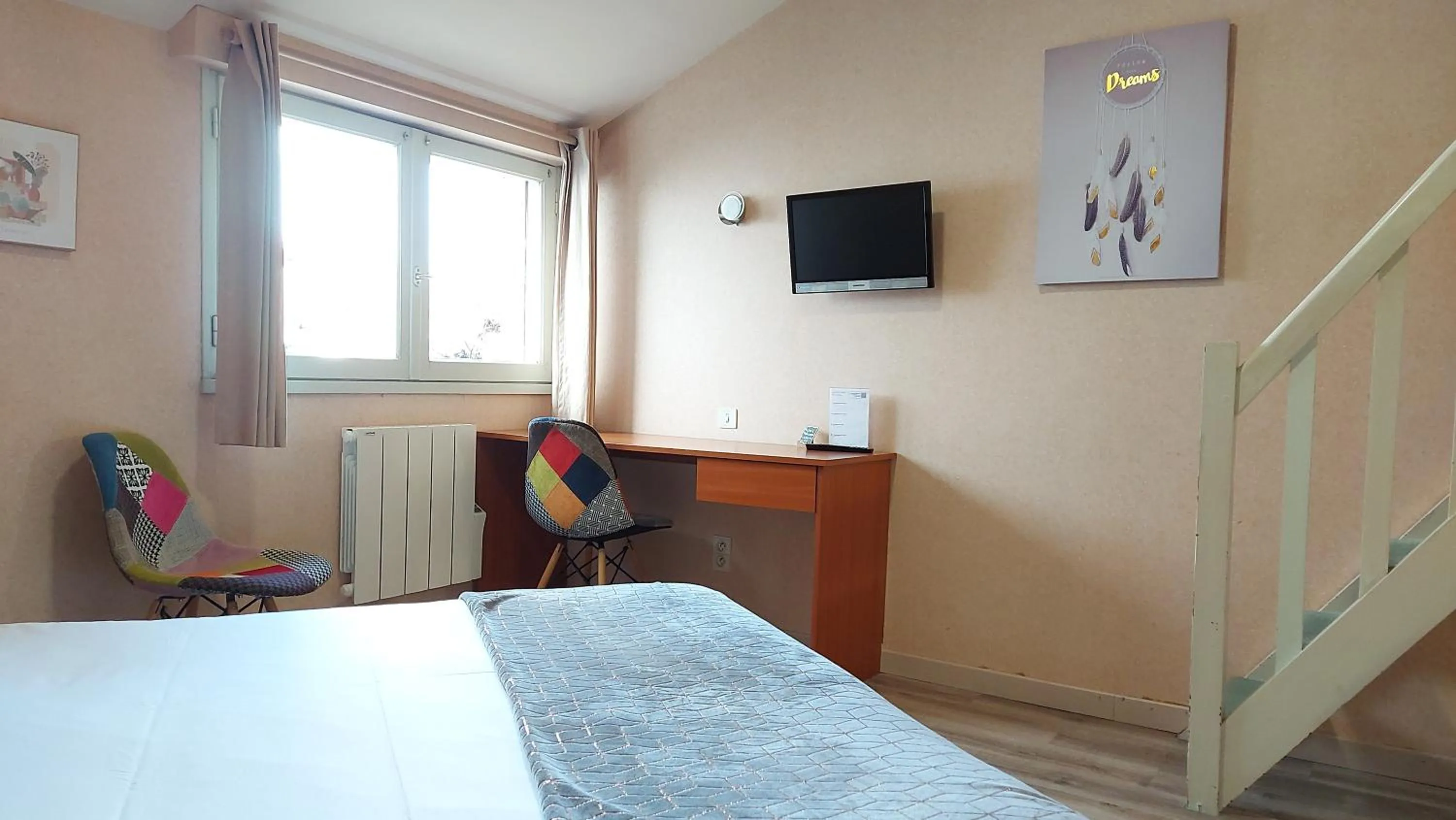 Photo of the whole room, Bed in Logis Hôtel Vannes Nord Le Clos Des Hortensias