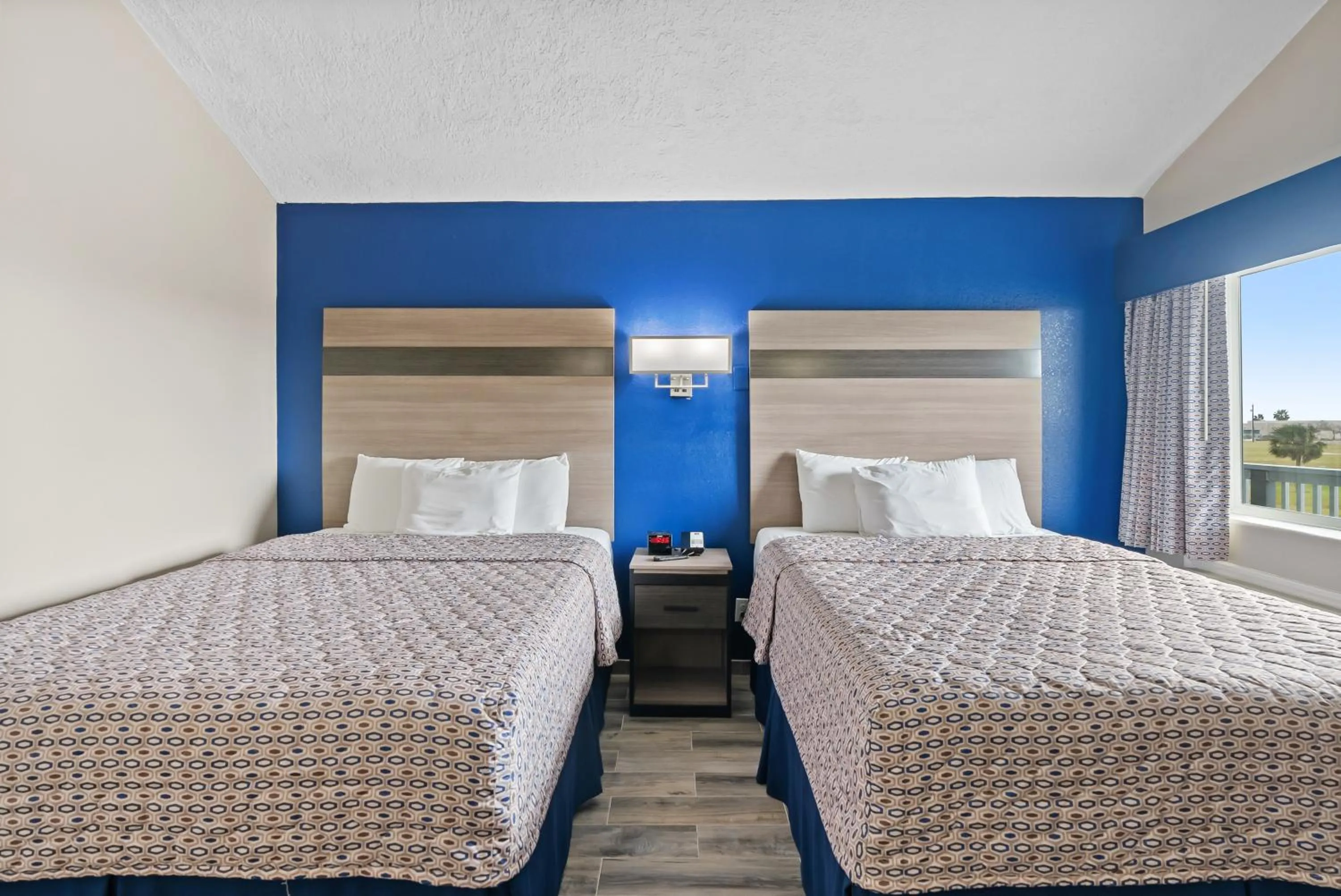 Bed in Blue Wave Inn