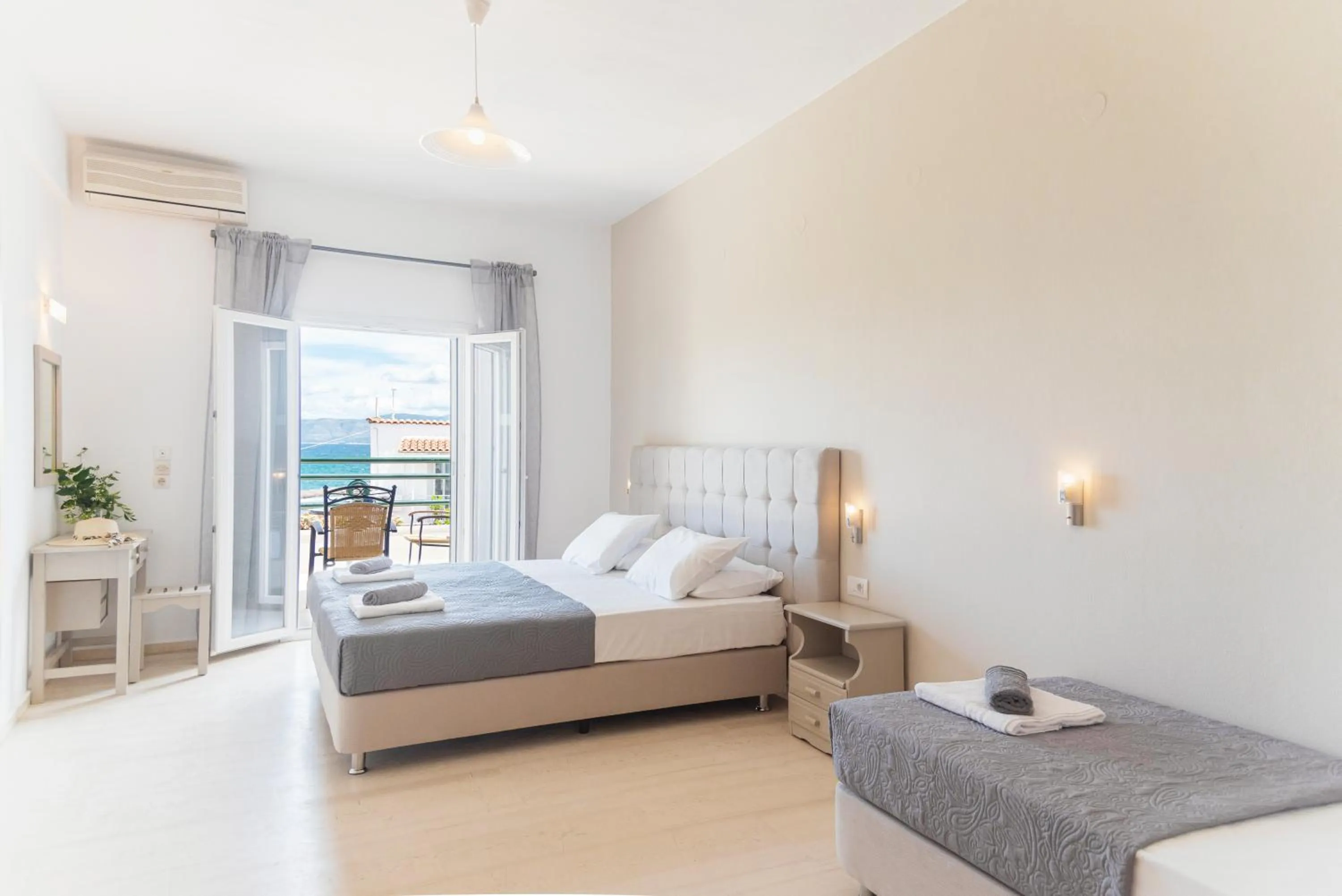 Bed in Ammos Apartments