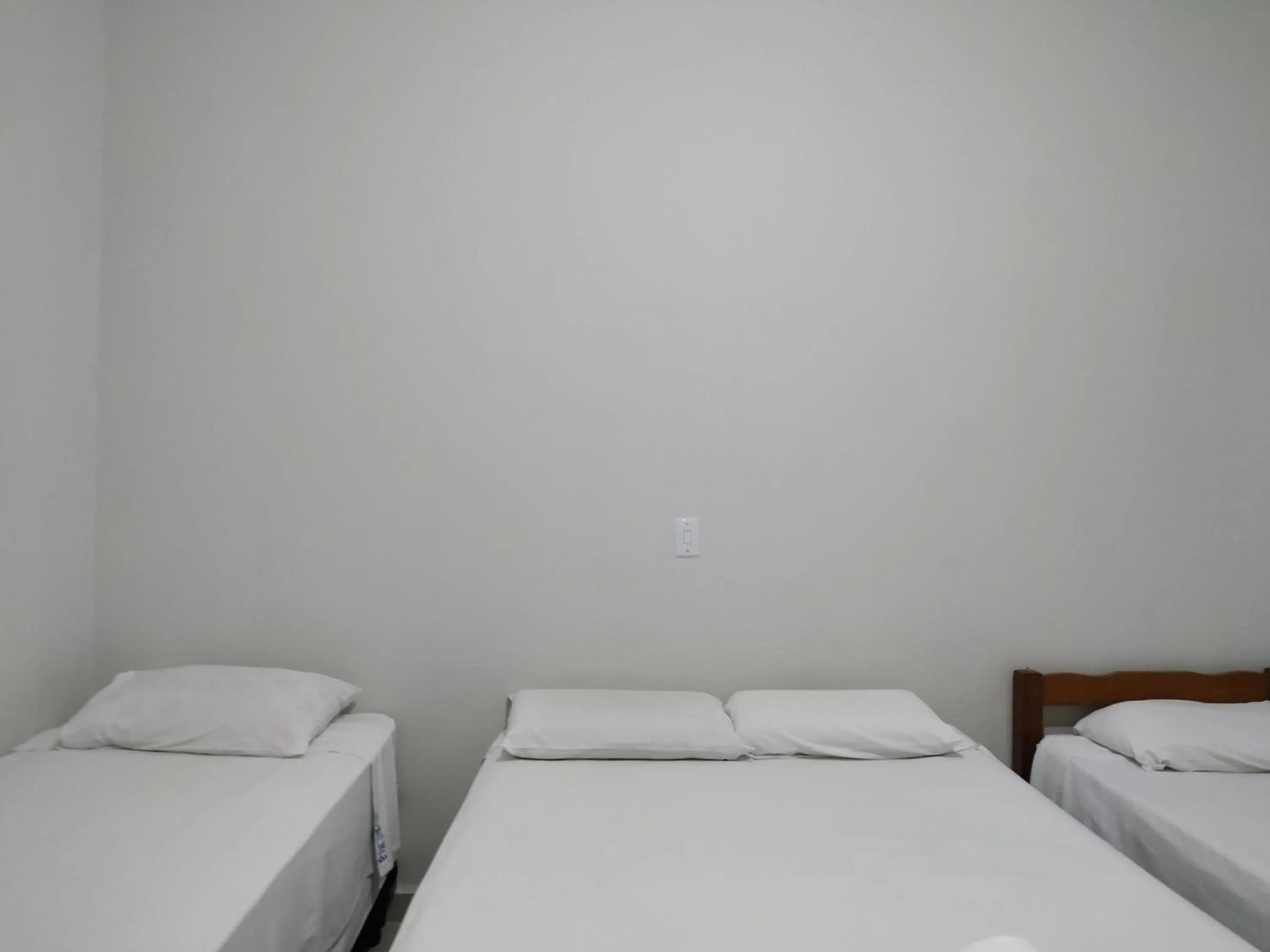Bed in Pousada Facincani