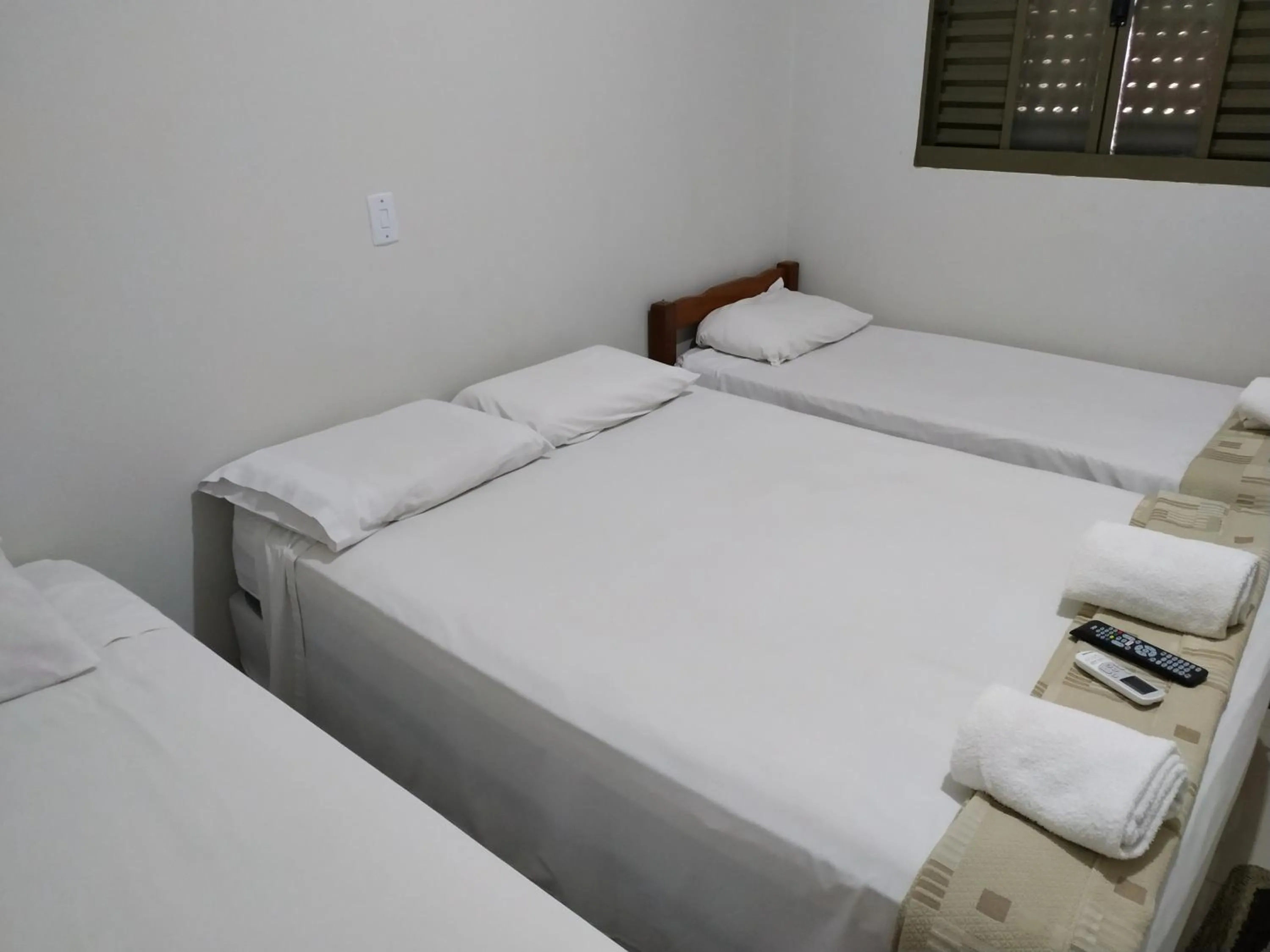 Bed in Pousada Facincani