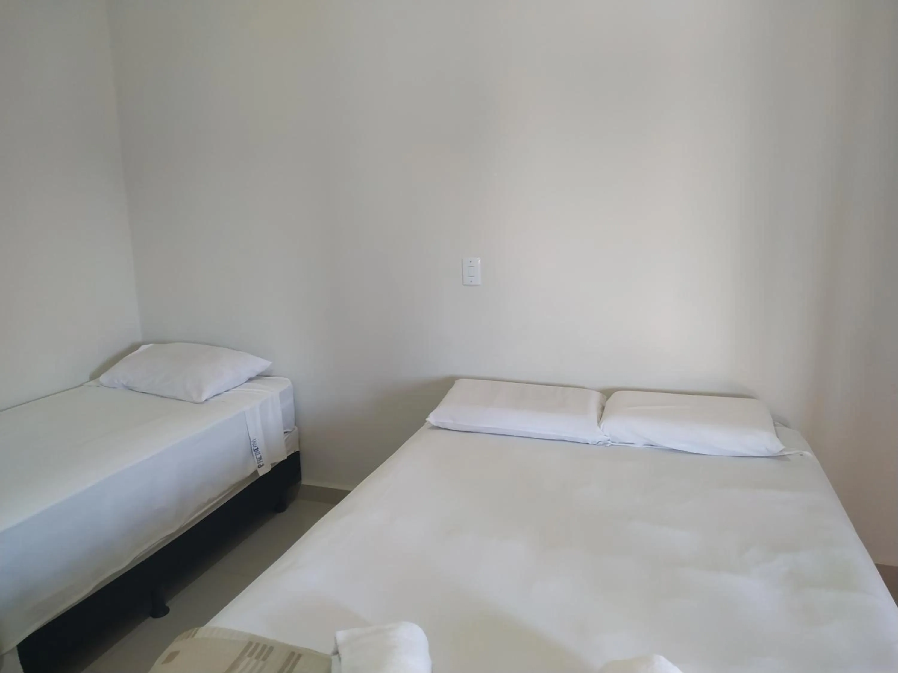 Bed in Pousada Facincani