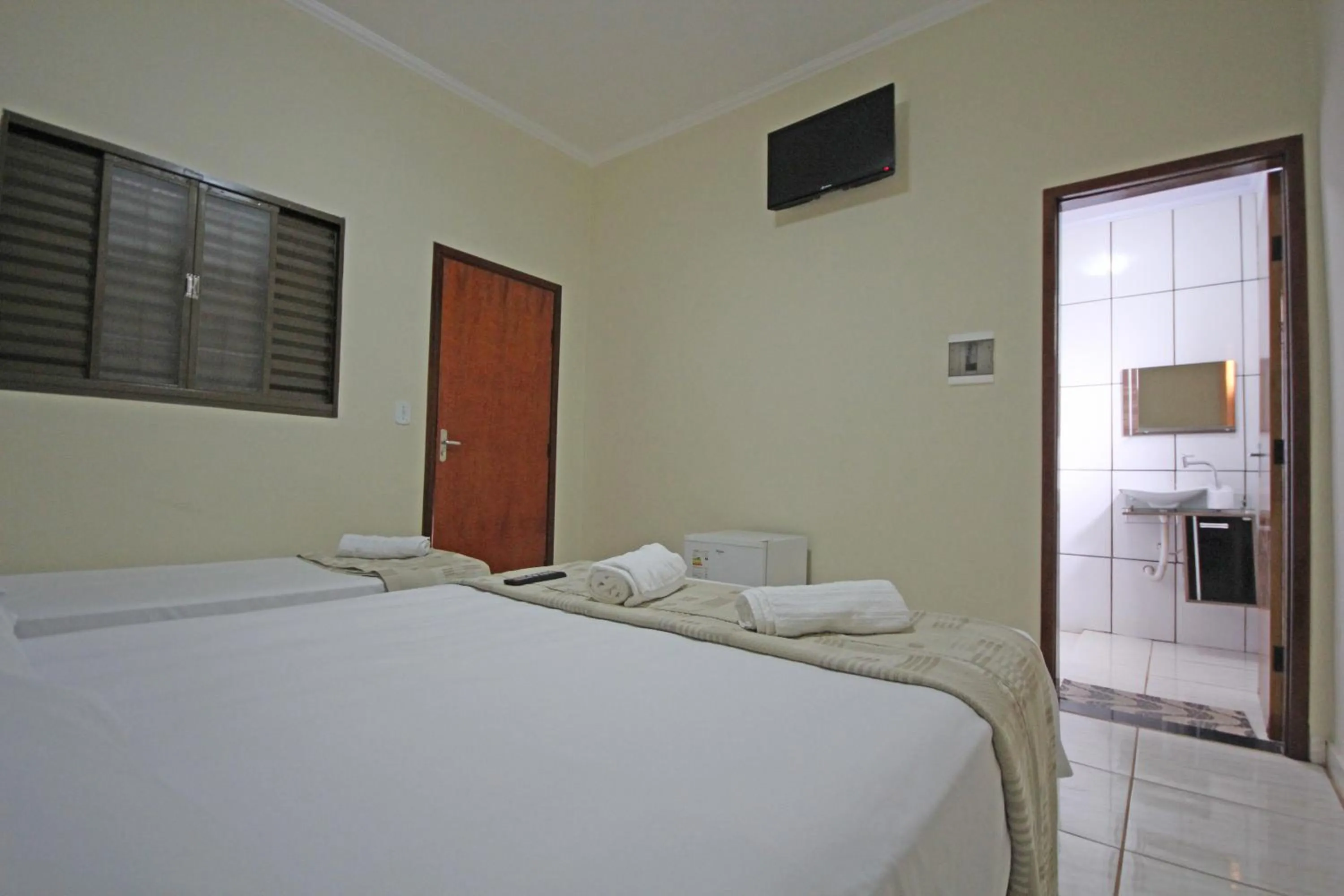 Bed in Pousada Facincani