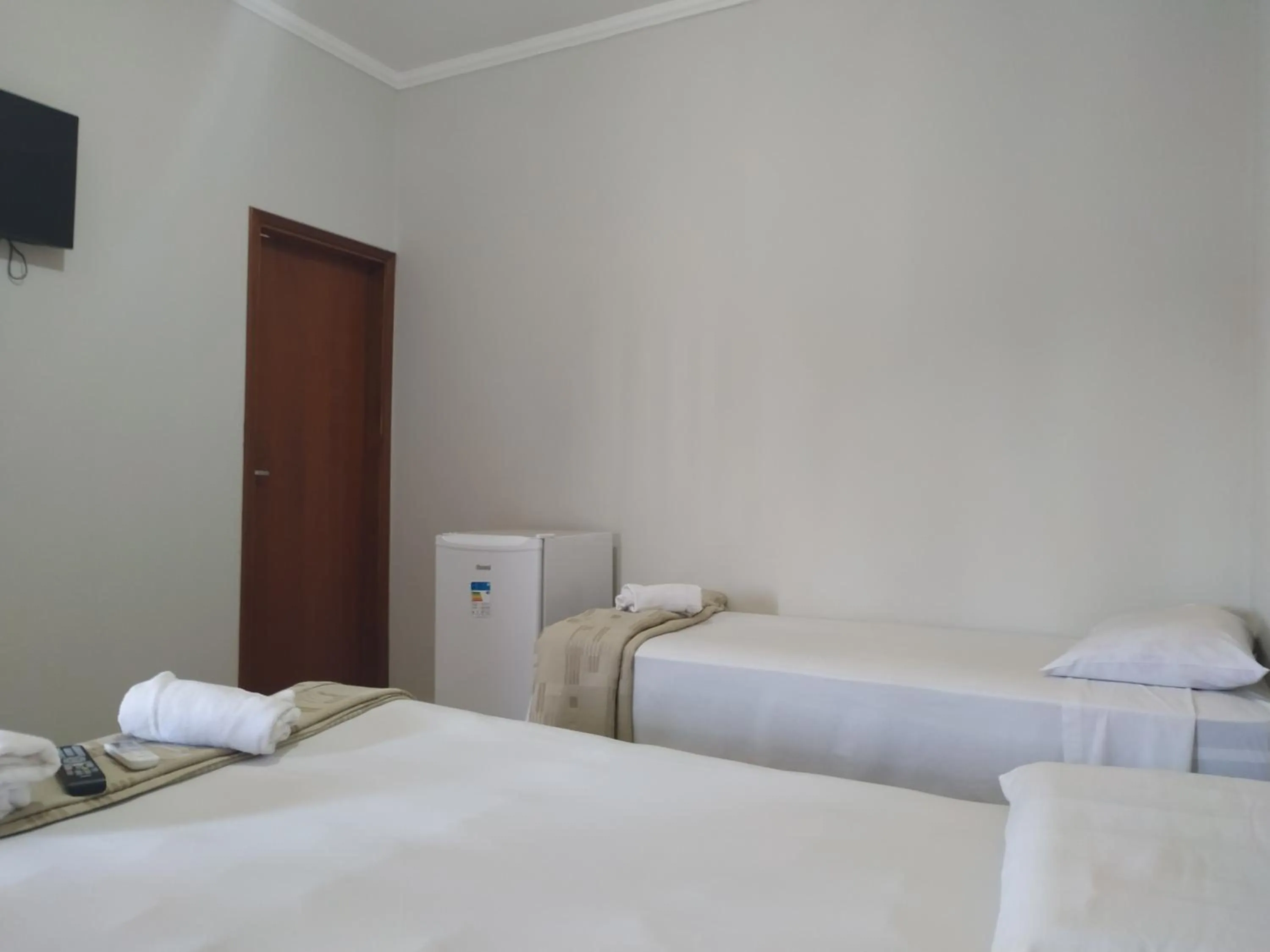 Bed in Pousada Facincani
