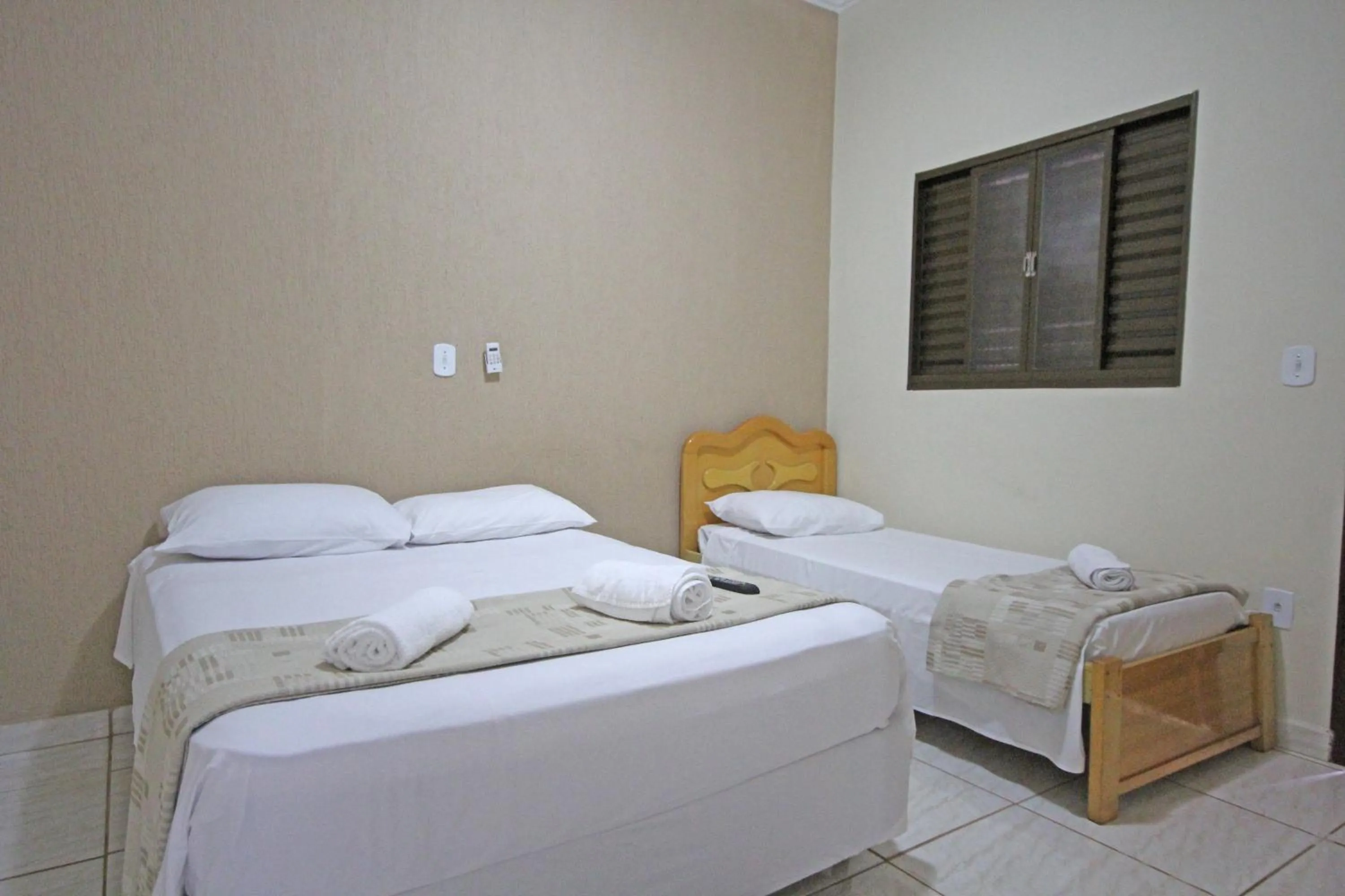 Bed in Pousada Facincani