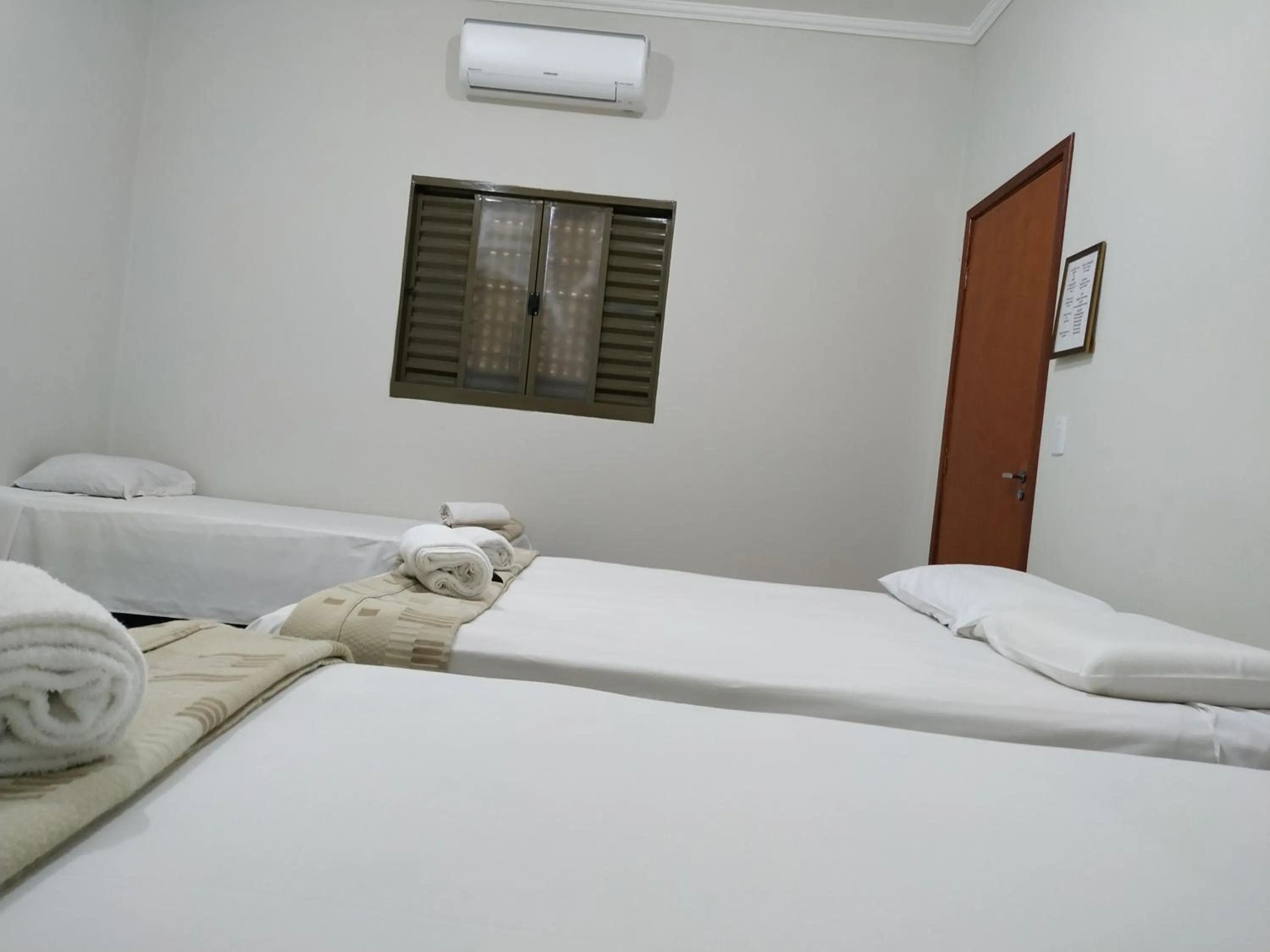 Bed in Pousada Facincani