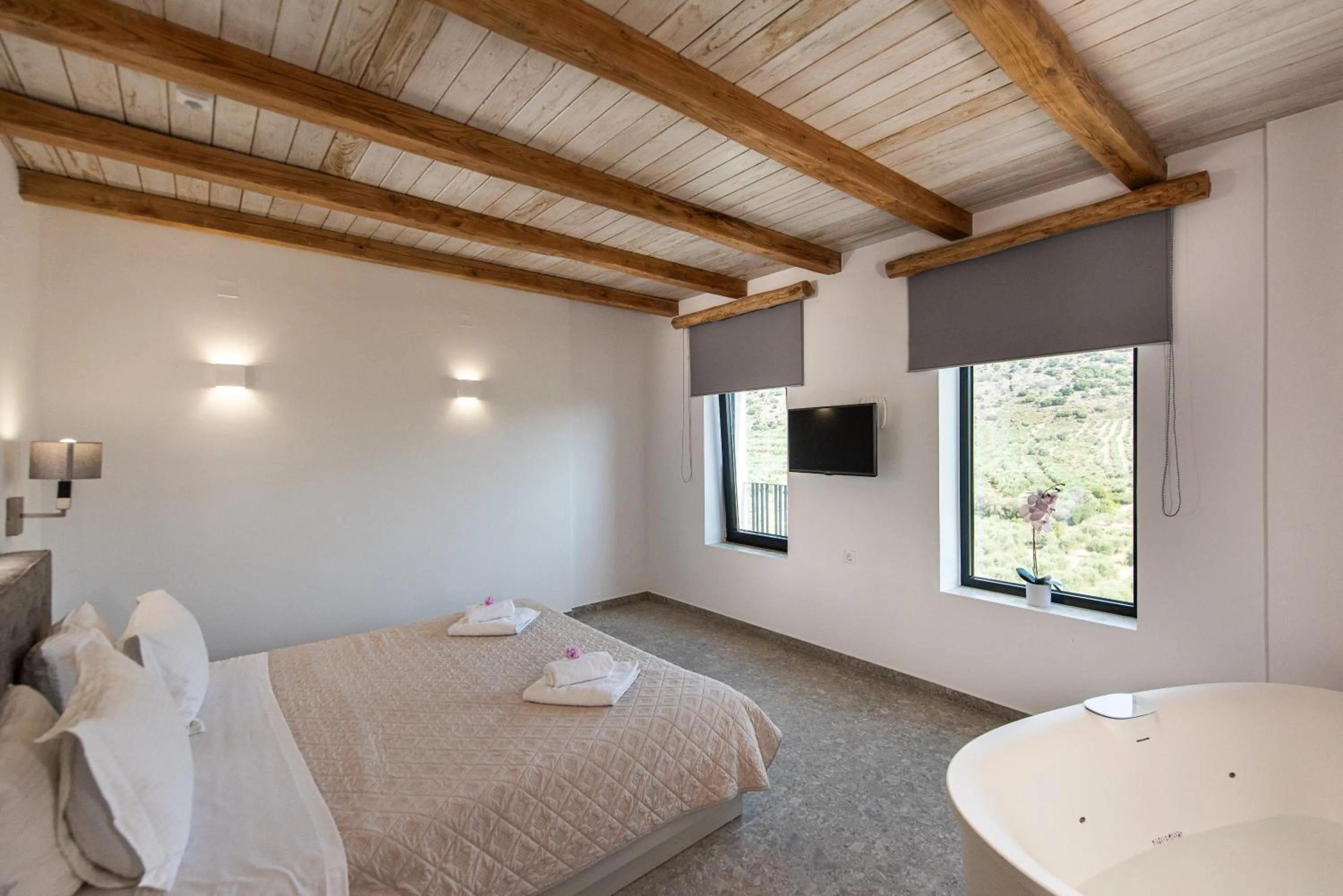 Bed in Lameriana Luxury Village
