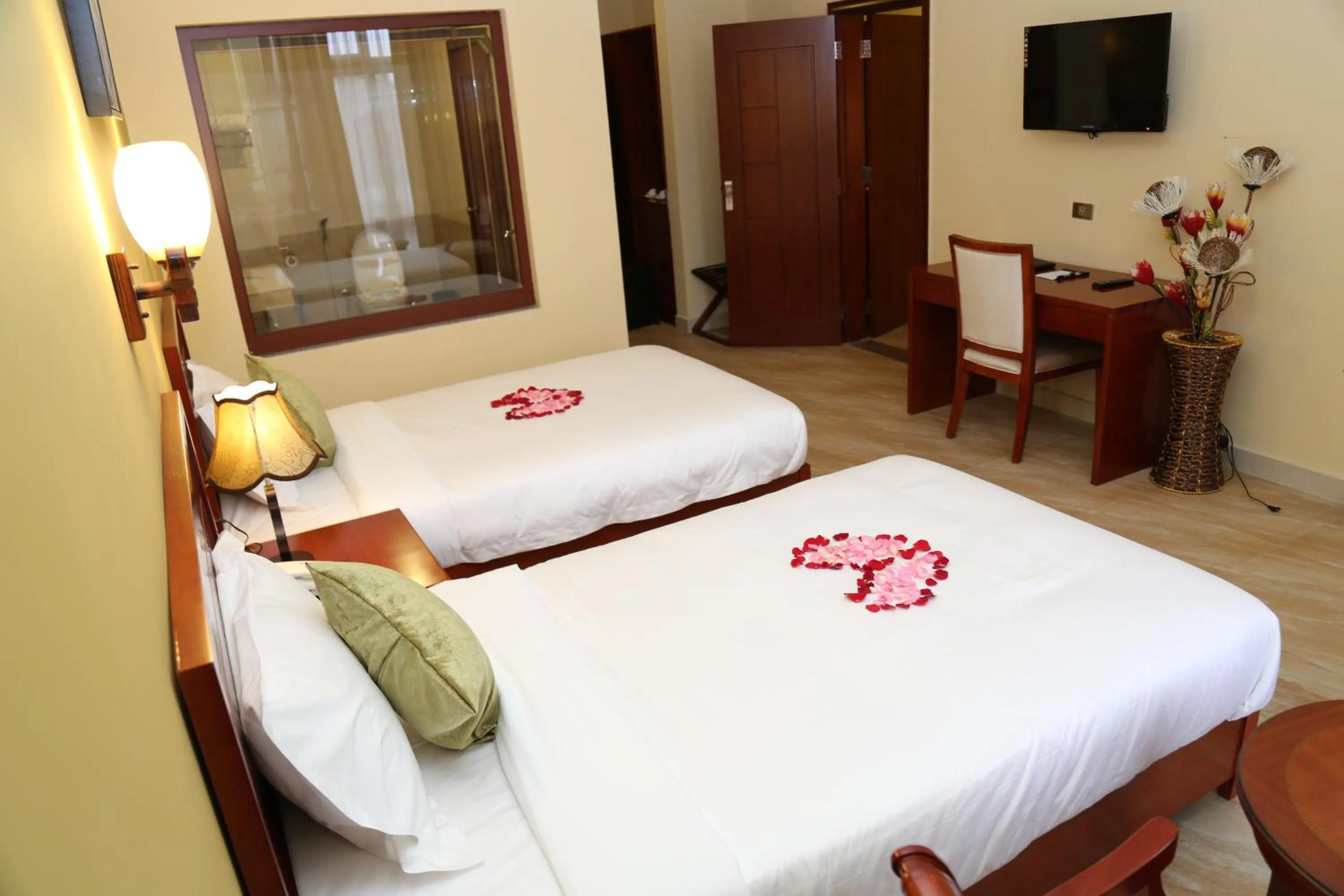 Bed in Ye Afoli International Hotel